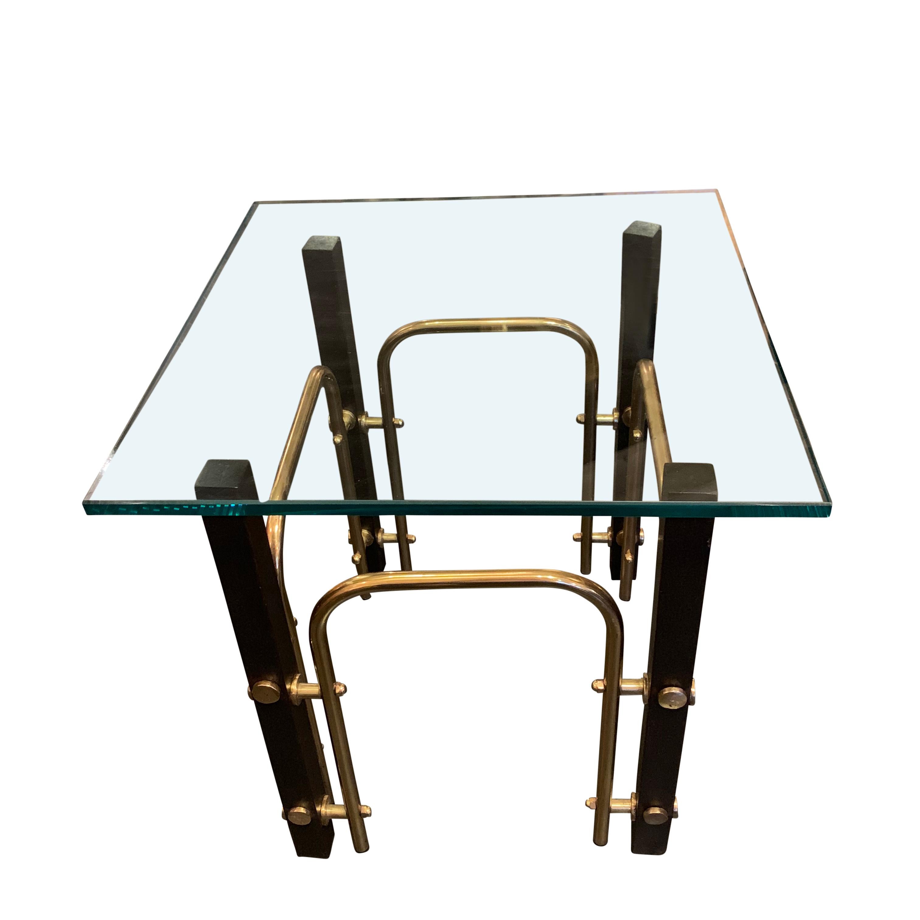Midcentury French pair of coffee tables with ebonized wood and brass tubing details.
New square glass tops.
 