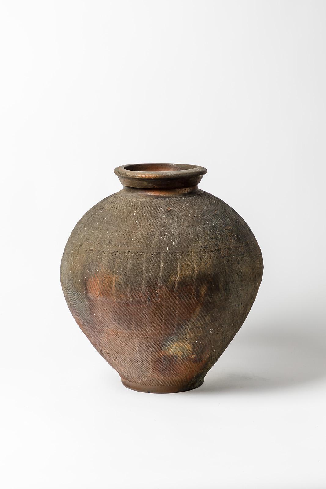 Steen Kepp - La Borne

Realised circa 1975-1980

Large brown and black stoneware ceramic floor vase.

Signed under the base

Original perfect condition

Measures: Height 40 cm
Large 33 cm.