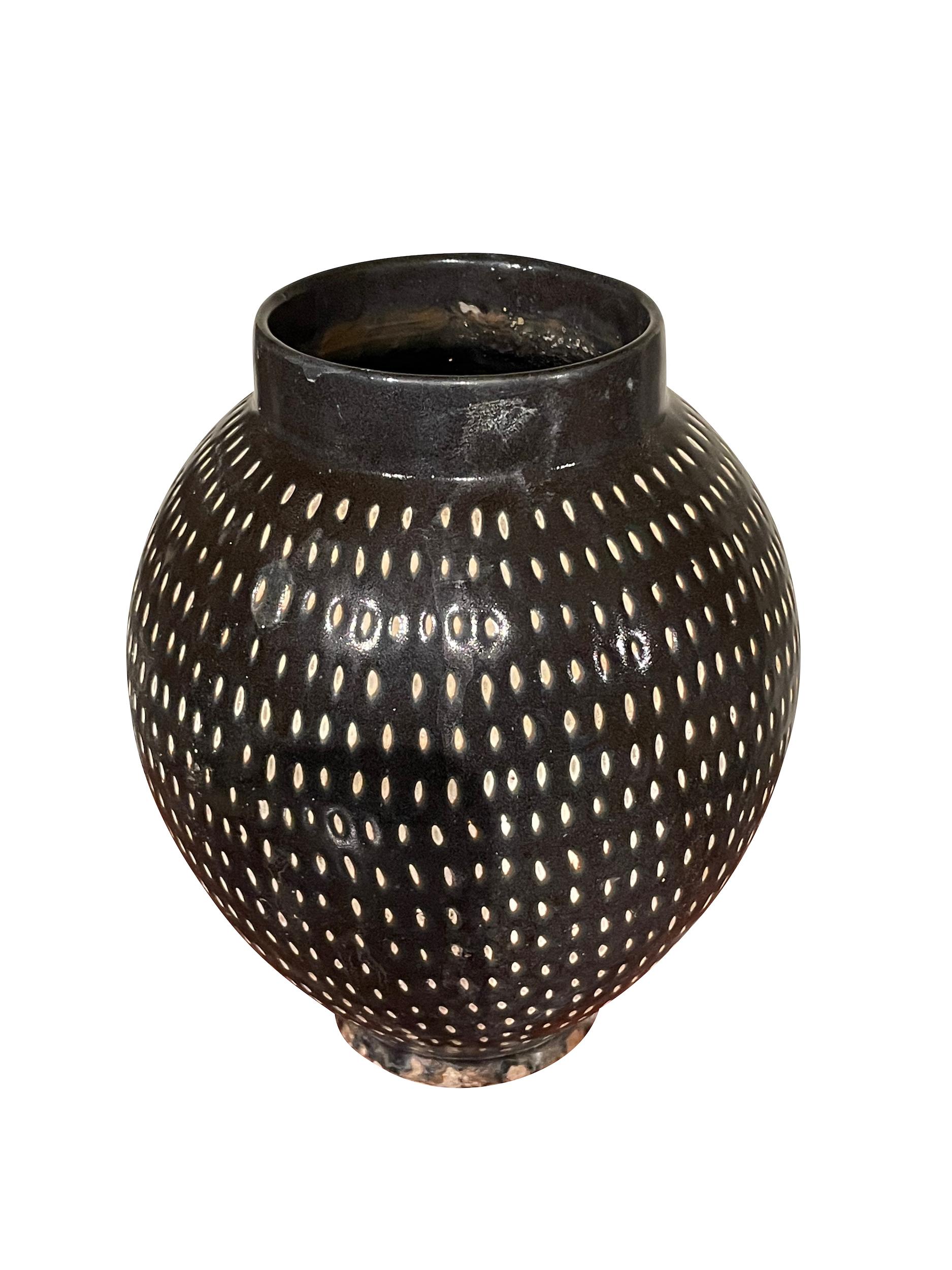 Contemporary Chinese black vase with decorative cream pin dots.
Two available and sold individually.