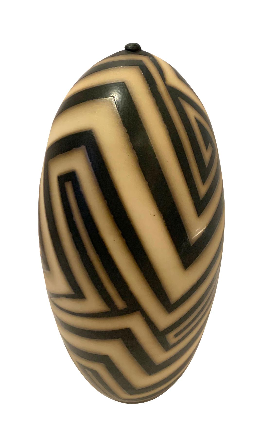 Contemporary made in the USA stoneware black and cream geometric stripe pattern design.
Hand made one of a kind.