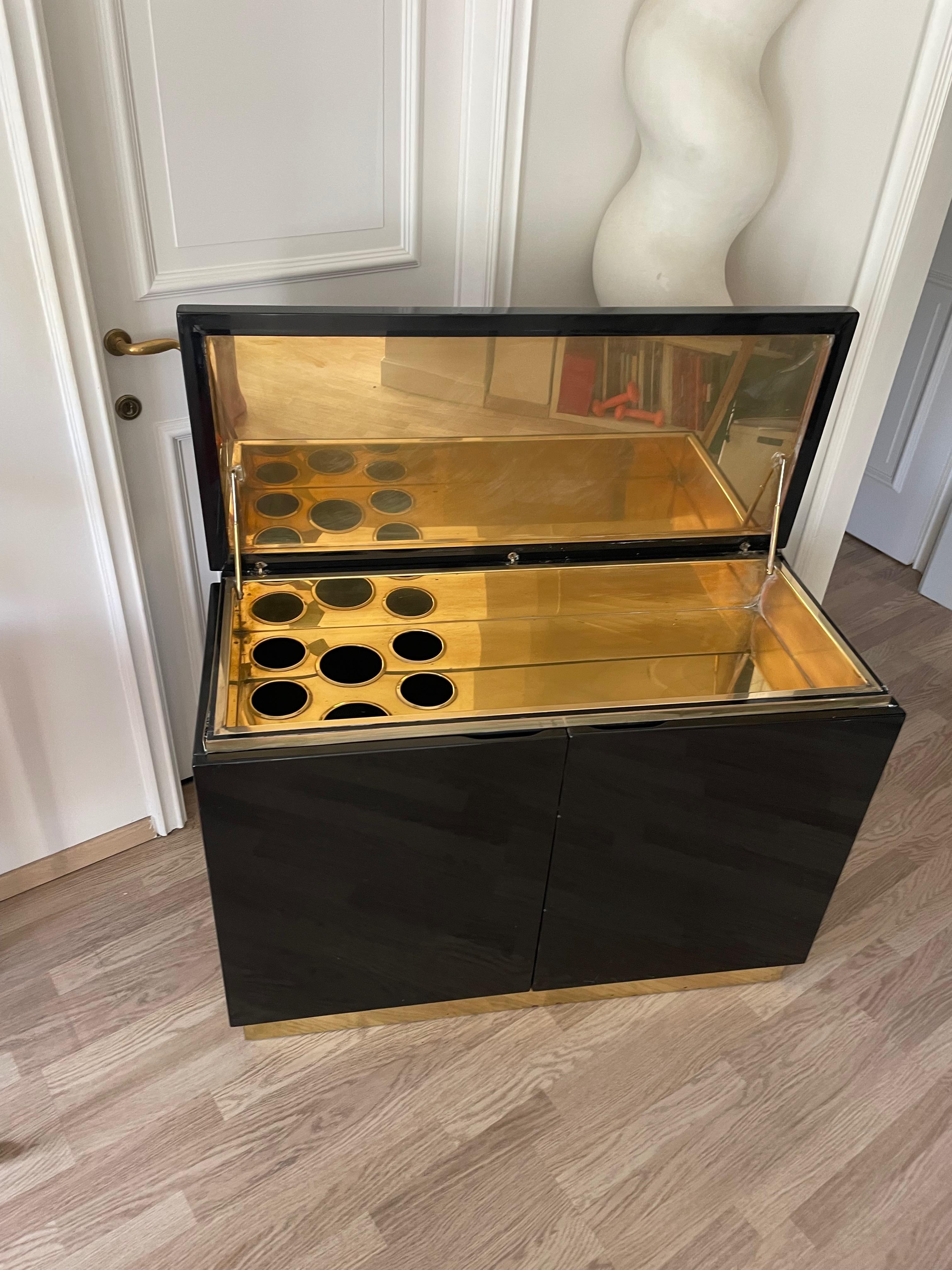 French Black and Gold Dry Bar by Jean- Claude Mahey, France 1975. For Sale