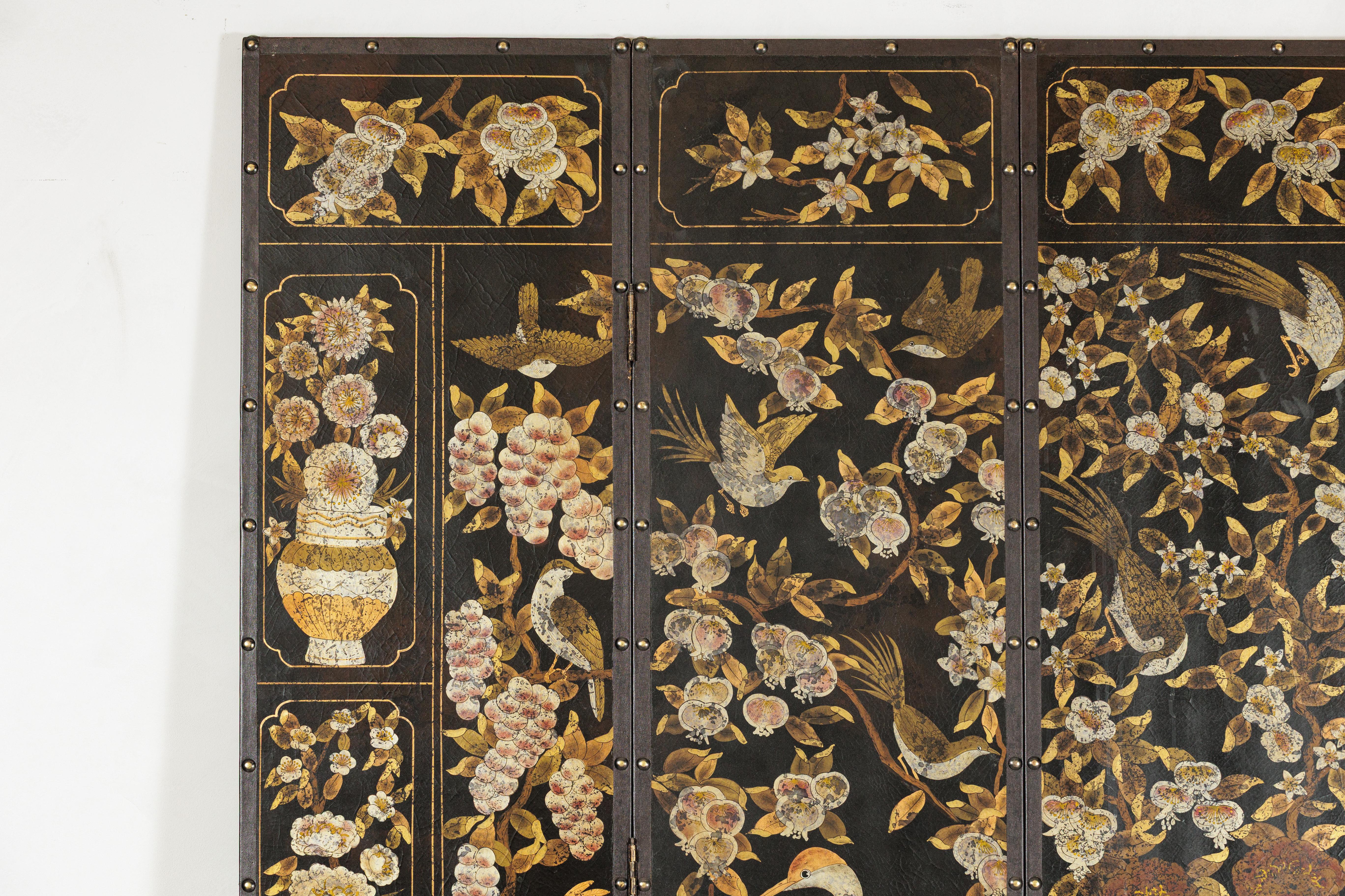 Black and Gold Four-Panel Screen with Cranes, Blossoms, and Nailhead Detail In Good Condition For Sale In Yonkers, NY