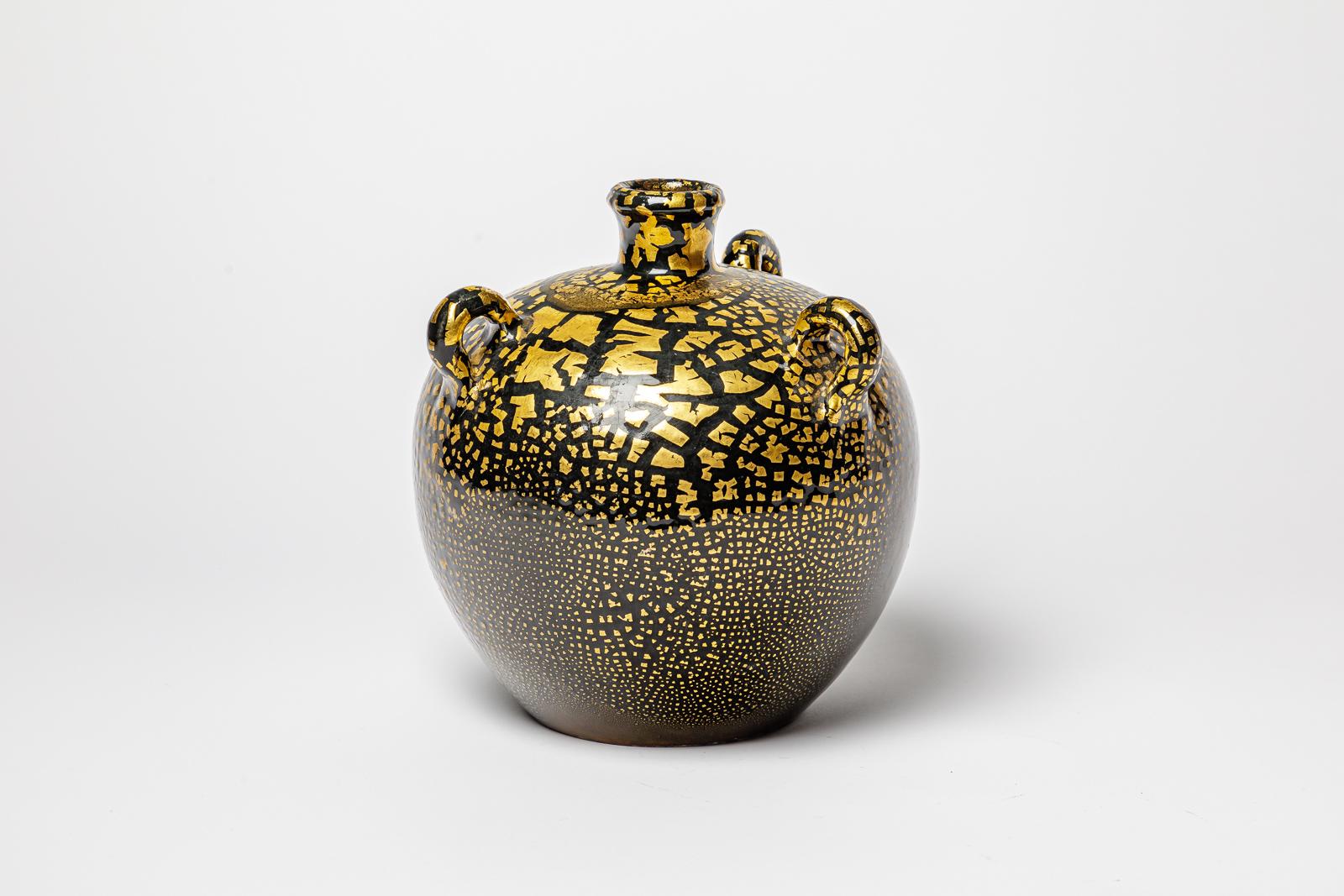 Beaux Arts Black and gold glazed ceramic vase in the style of Jean Besnard, circa 1950-1960 For Sale