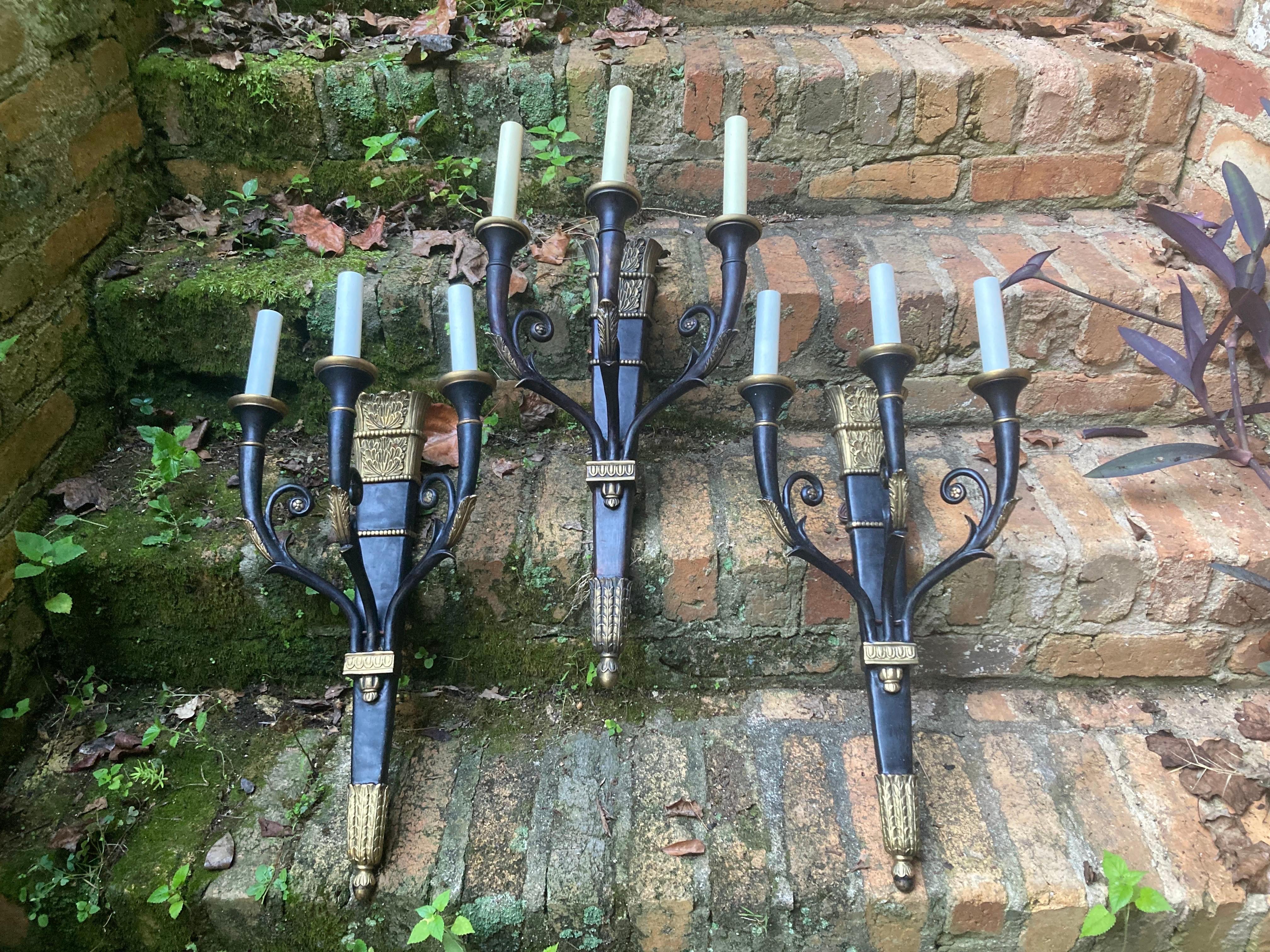 A beautiful trio dating back to the 1940’s. wall plates included but not photographed. 
the body of all 3 are 21 tall and candle holders almost 24.
12 wide and 6 deep
2 sconces have 4.5 inches mounts for chandelier bulb. one has 6 inch mount. newer