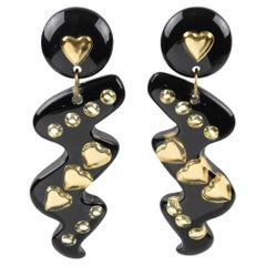 Pendientes colgantes de resina Lucite con inclusiones negras y doradas