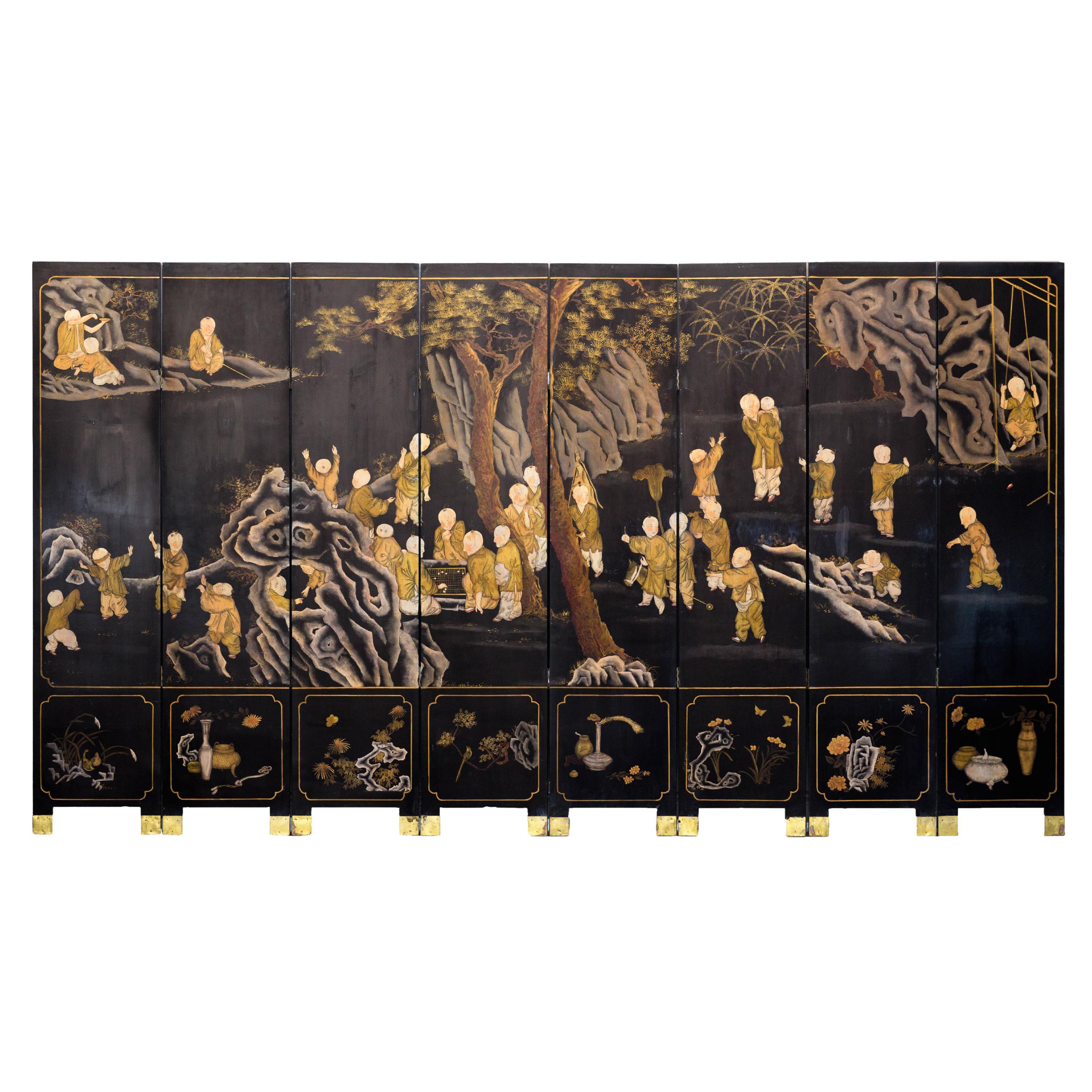Black and Gold Lacquered Eight-Panel Screen with Monks and Children Scene