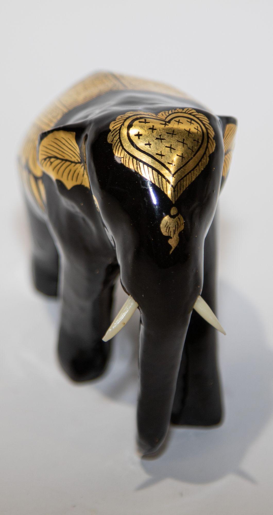 Hand-Carved Black and Gold Lacquered Thai Elephant Sculpture For Sale