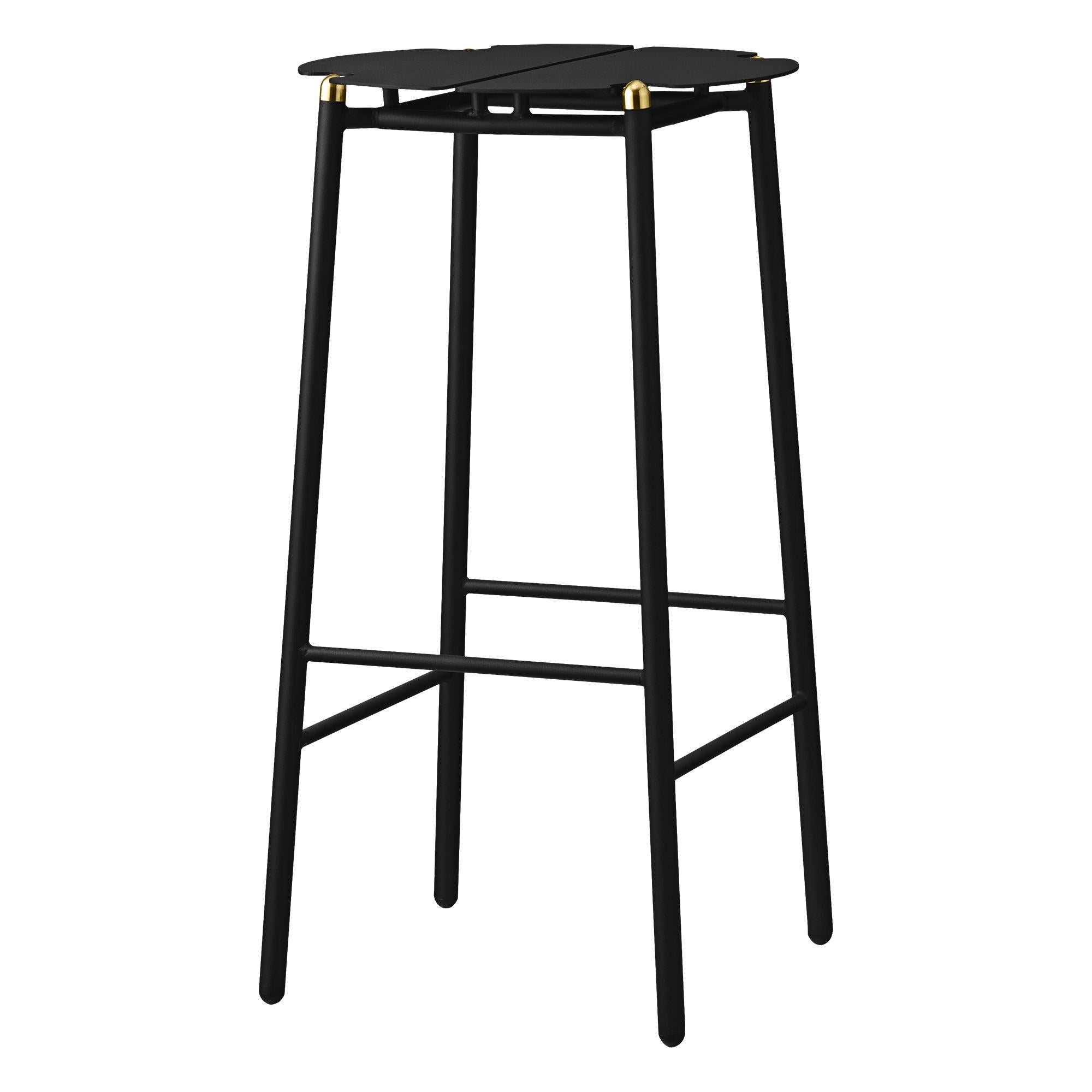Black and gold Minimalist bar stool 
Dimensions: Diameter 38 x H 75 cm 
Materials: Steel w. matte powder coating and aluminum w. matte powder coating.
Available in colors: Taupe, Bordeaux, Forest, Ginger Bread, Black and, Black and
