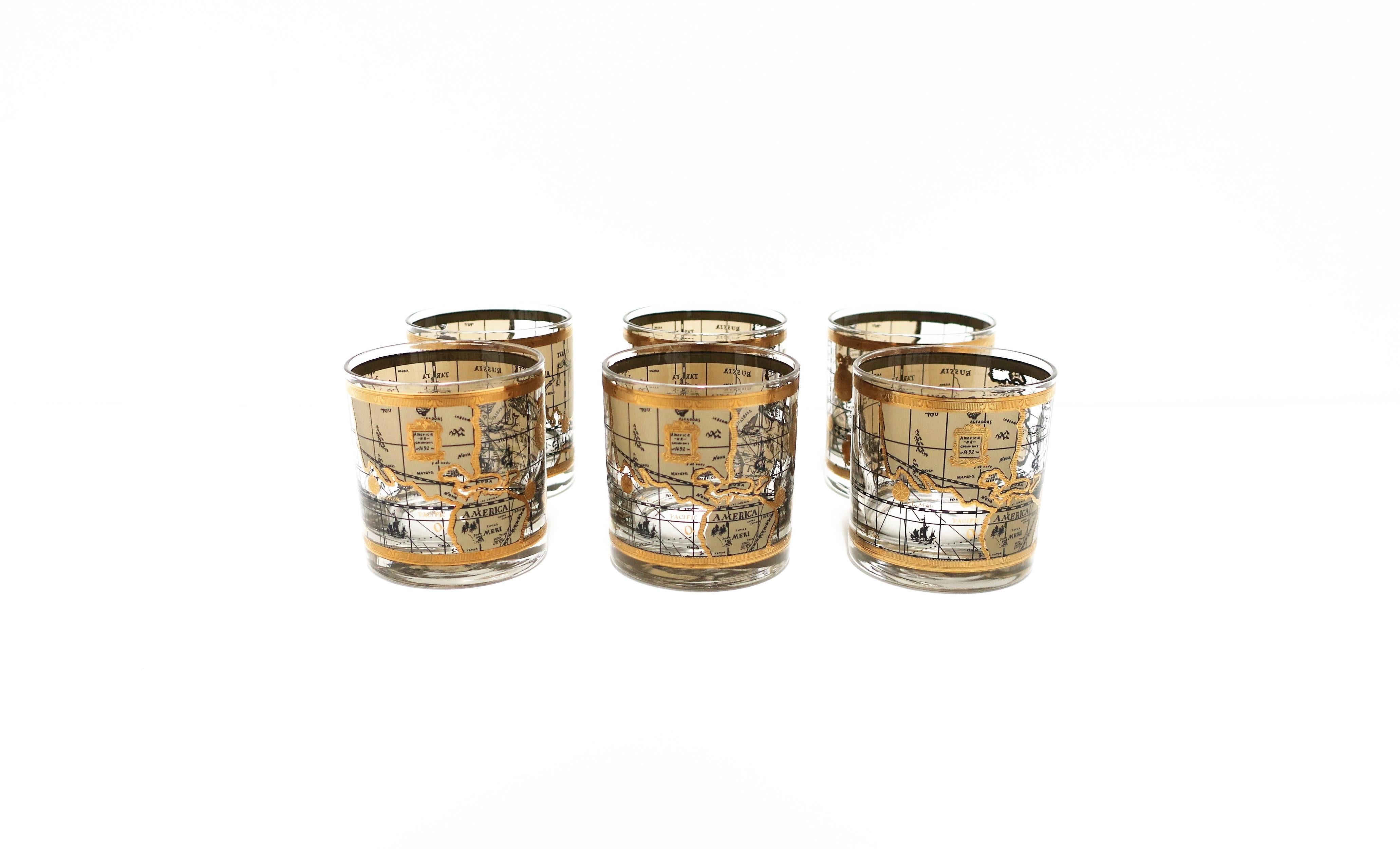 A set of size (6) mid-20th century world globe rocks' glasses, circa 1960s, USA. Beautiful glasses with a raised relief of the world map in black and gold. Dimensions: 2.88
