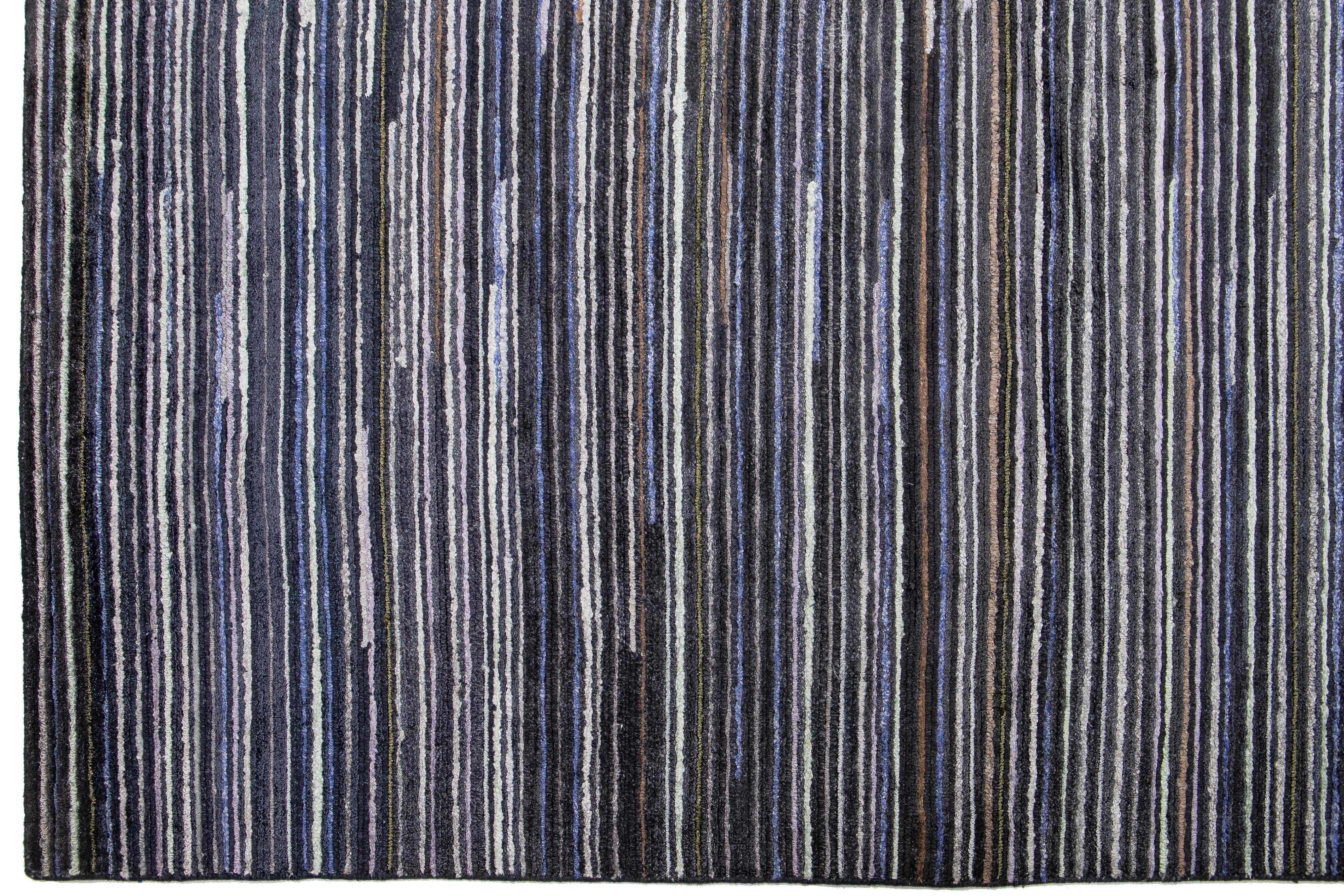 Organic Modern Black and Gray Modern Indian Wool Rug Features a Striped Design For Sale
