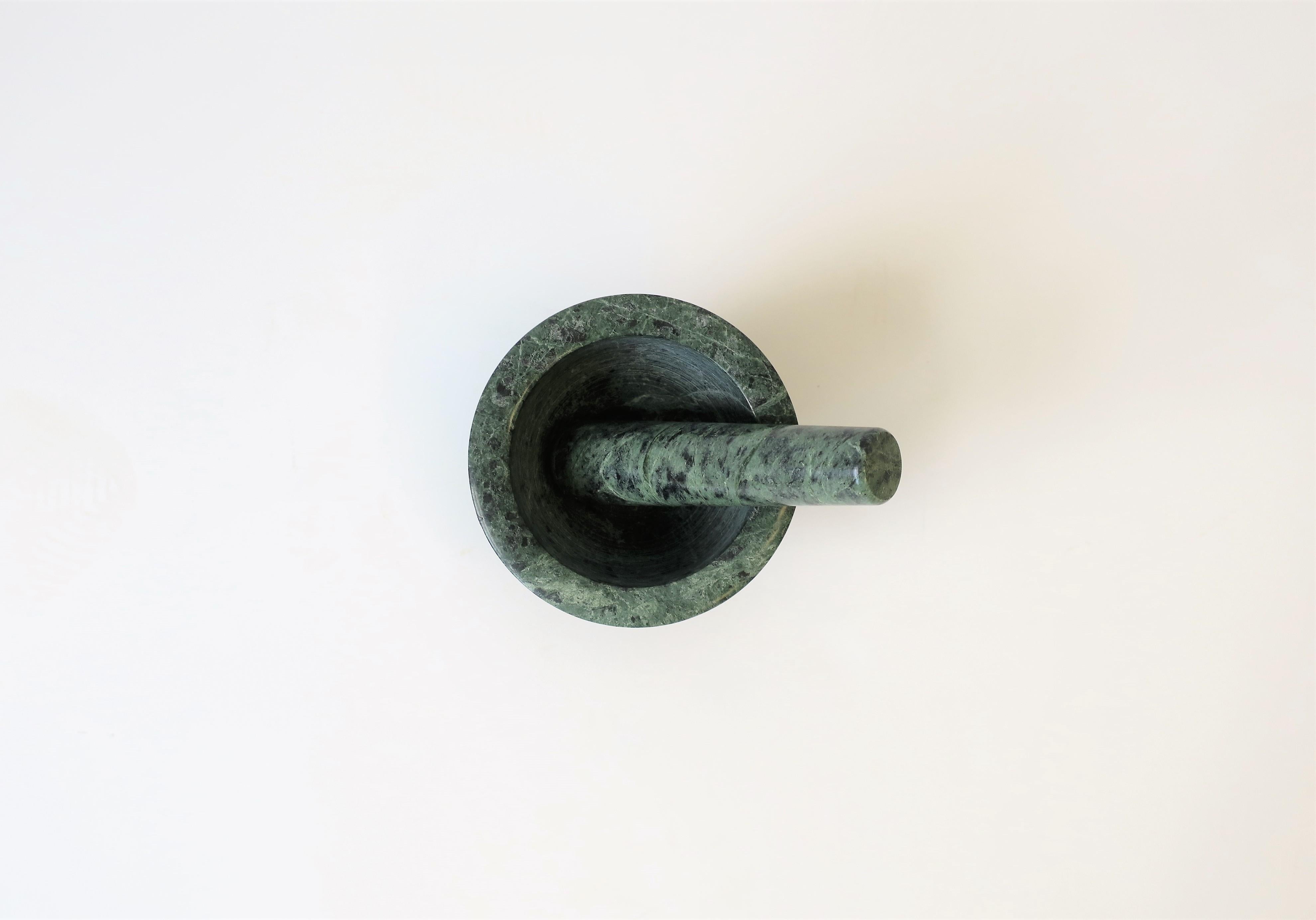 A dark green with traces of black marble mortar and pestle, circa mid to late-20th century. A great kitchen or bar accessory and a necessity. Marble is 1/2