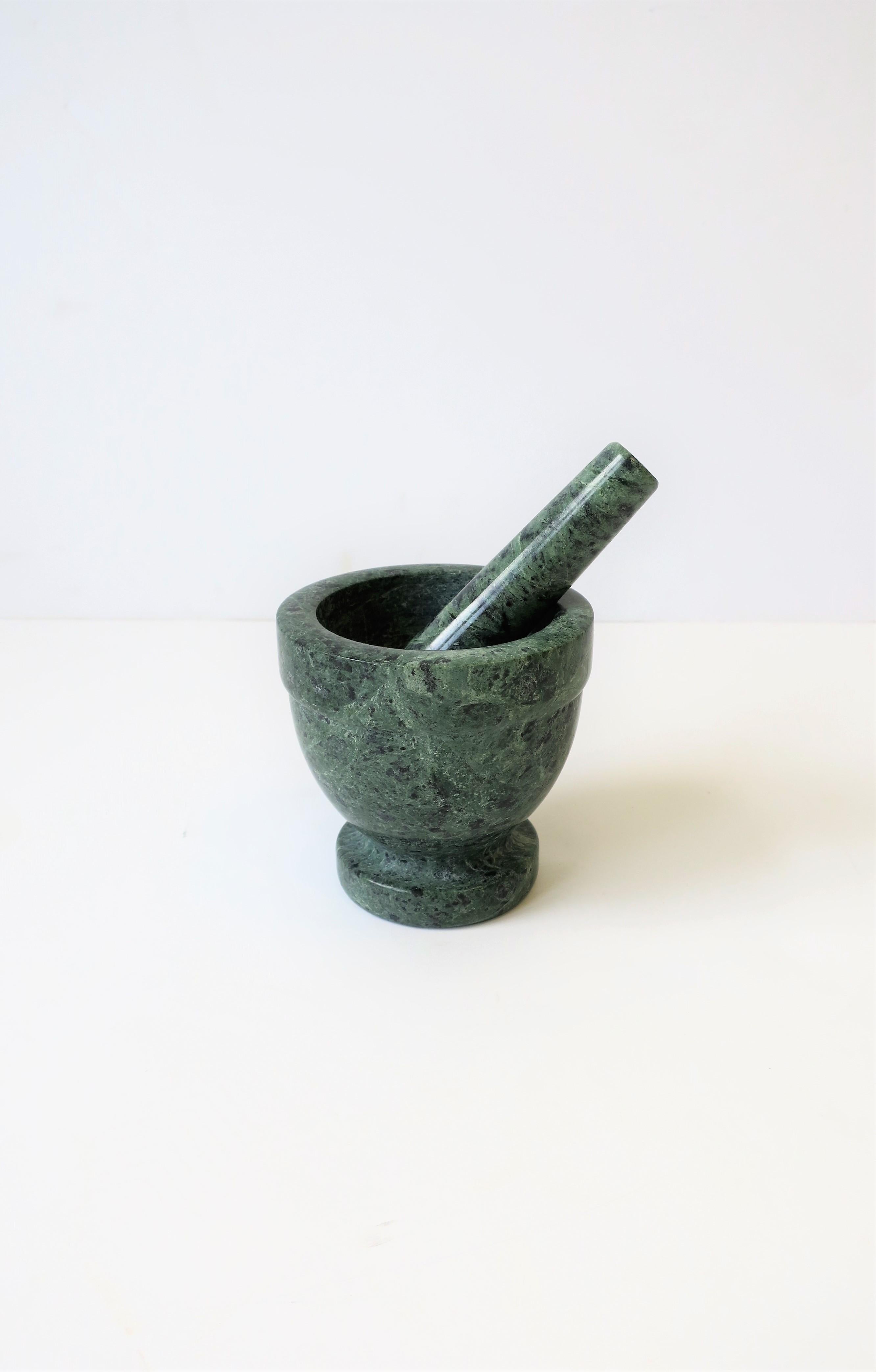 green marble mortar and pestle