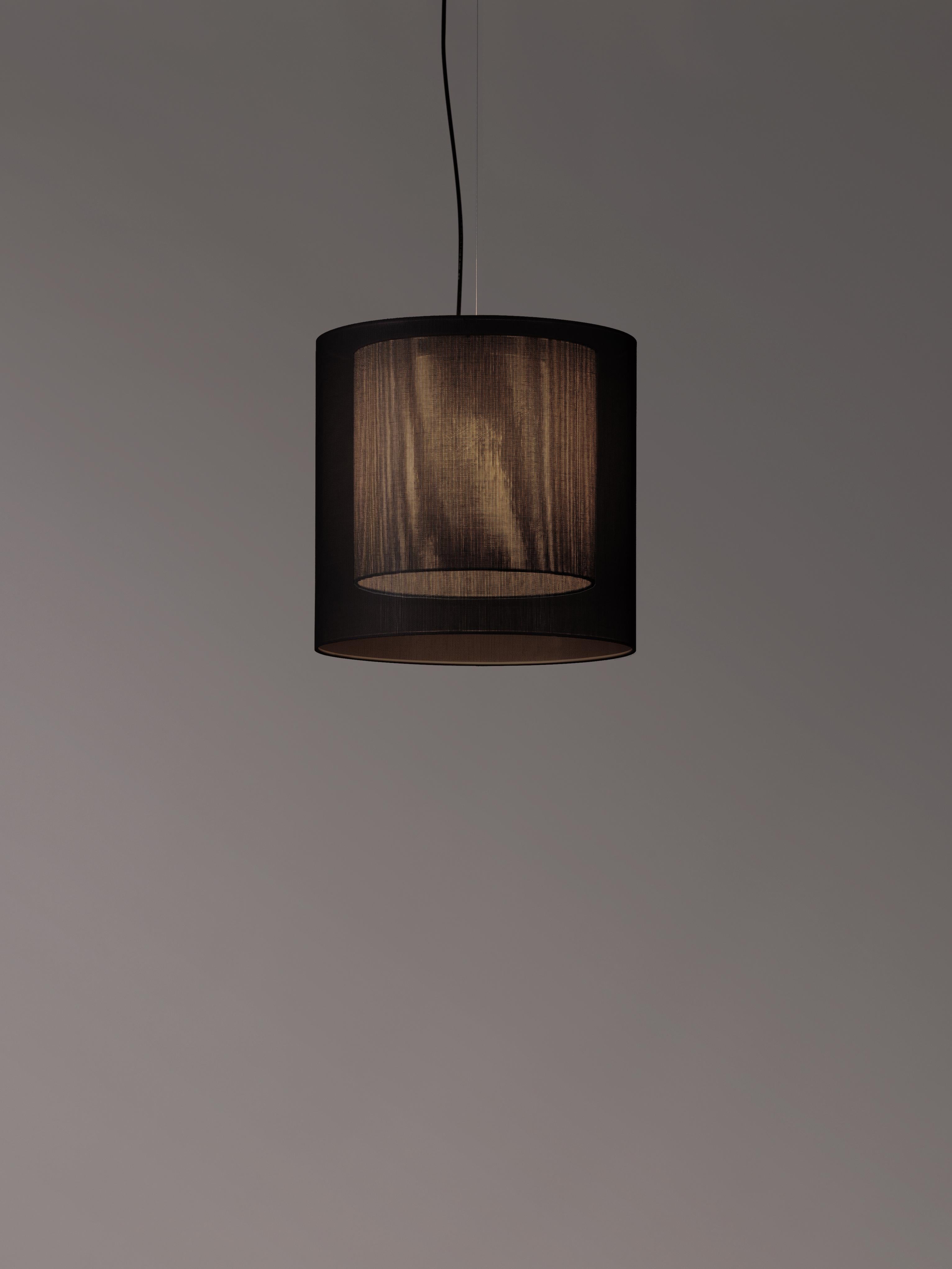 Black and grey Moaré MS pendant lamp by Antoni Arola
Dimensions: D 46 x H 45 cm
Materials: Metal, polyester.
Available in other colors and sizes.

Moaré’s multiple combinations of formats and colours make it highly versatile. The series takes