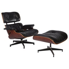 Black and Natural Cherry Herman Miller Eames Original Lounge Chair and Ottoman