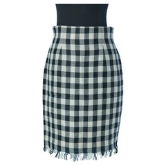 Black and off-white skirt with fringes edge and flower pocket CHANTAL THOMASS