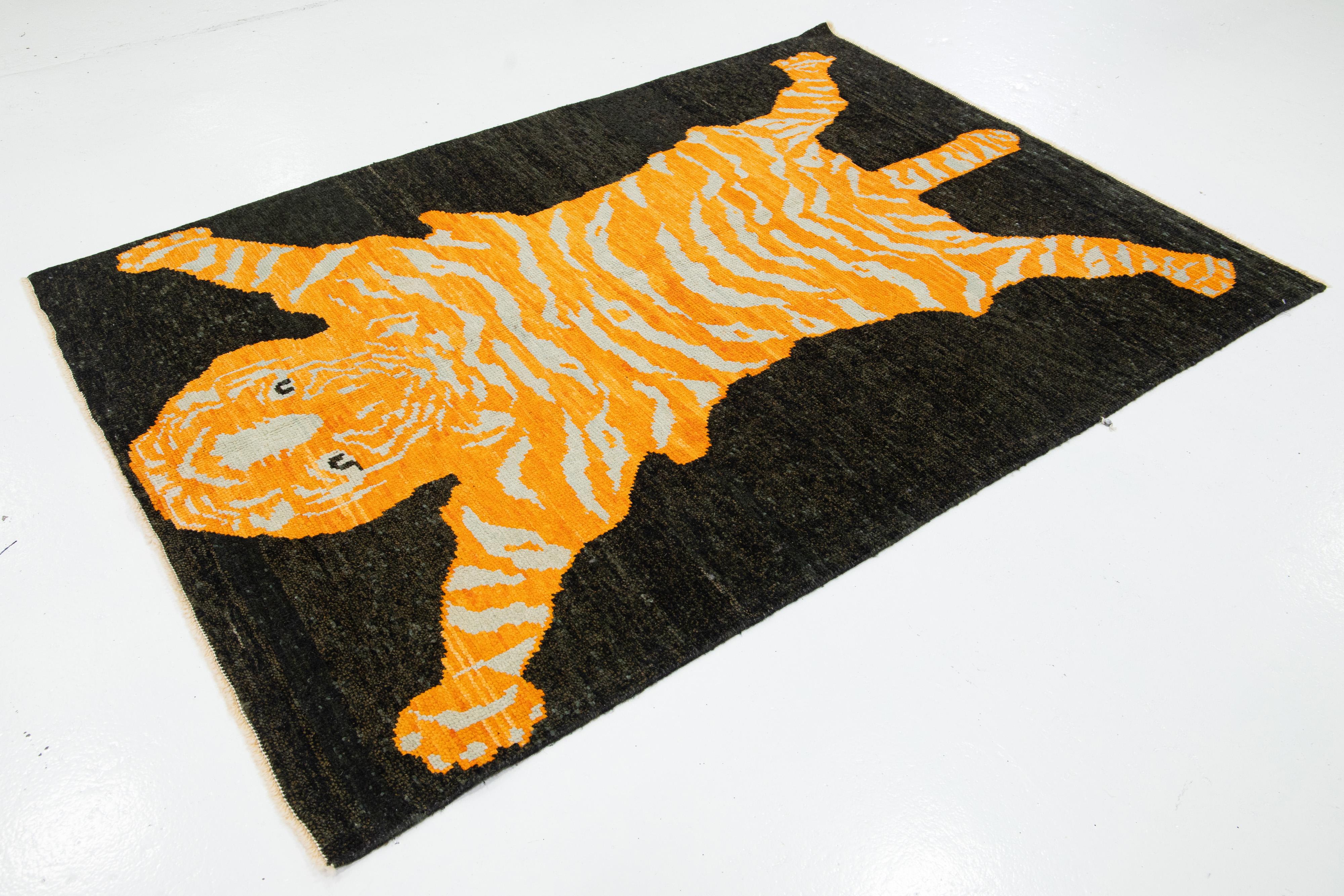 Hand-Knotted Black and Orange Handmade Wool Rug with a Tiger Design For Sale
