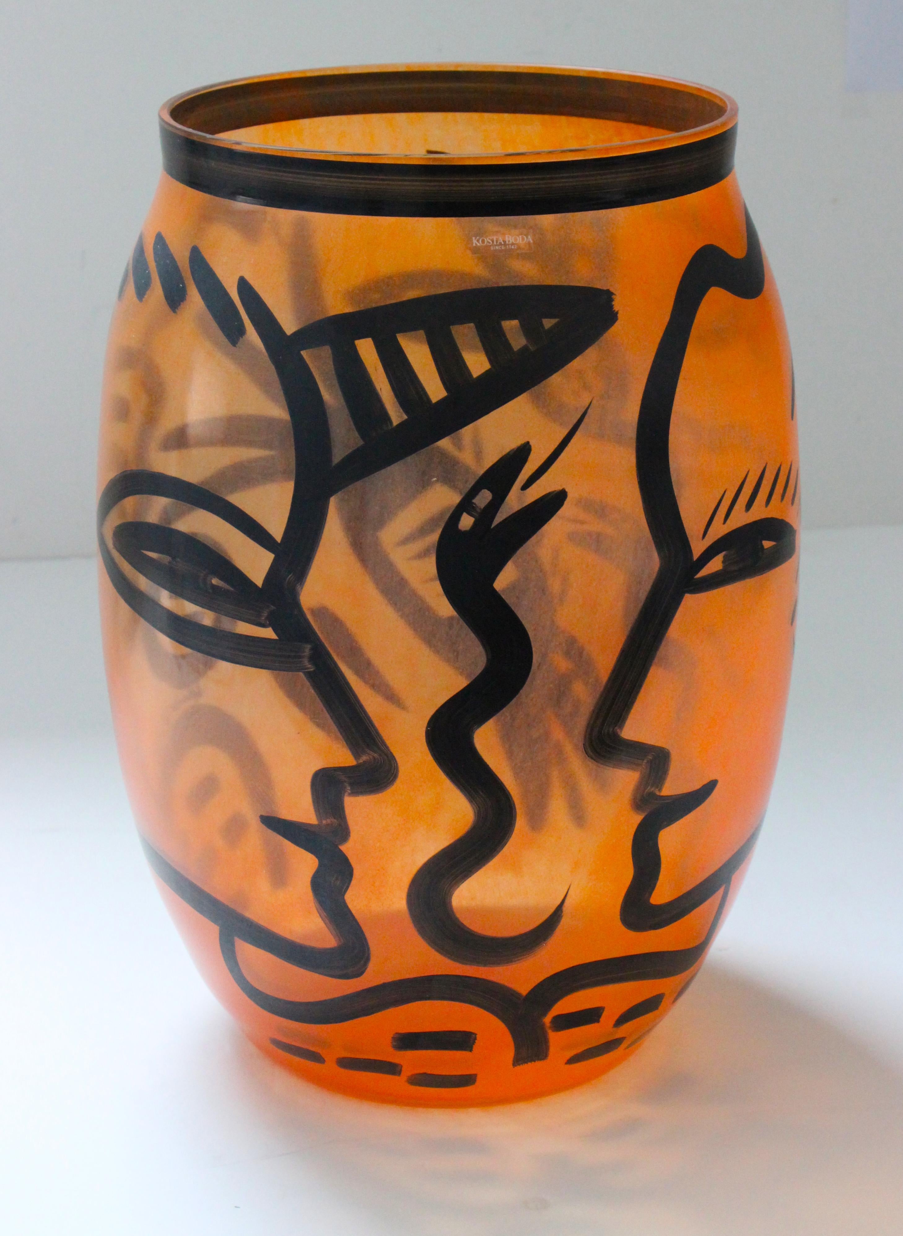 orange and black vase