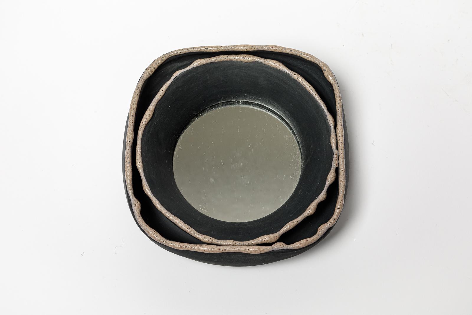 French Black and pink glazed ceramic mirror by Mia Jensen, 2023.