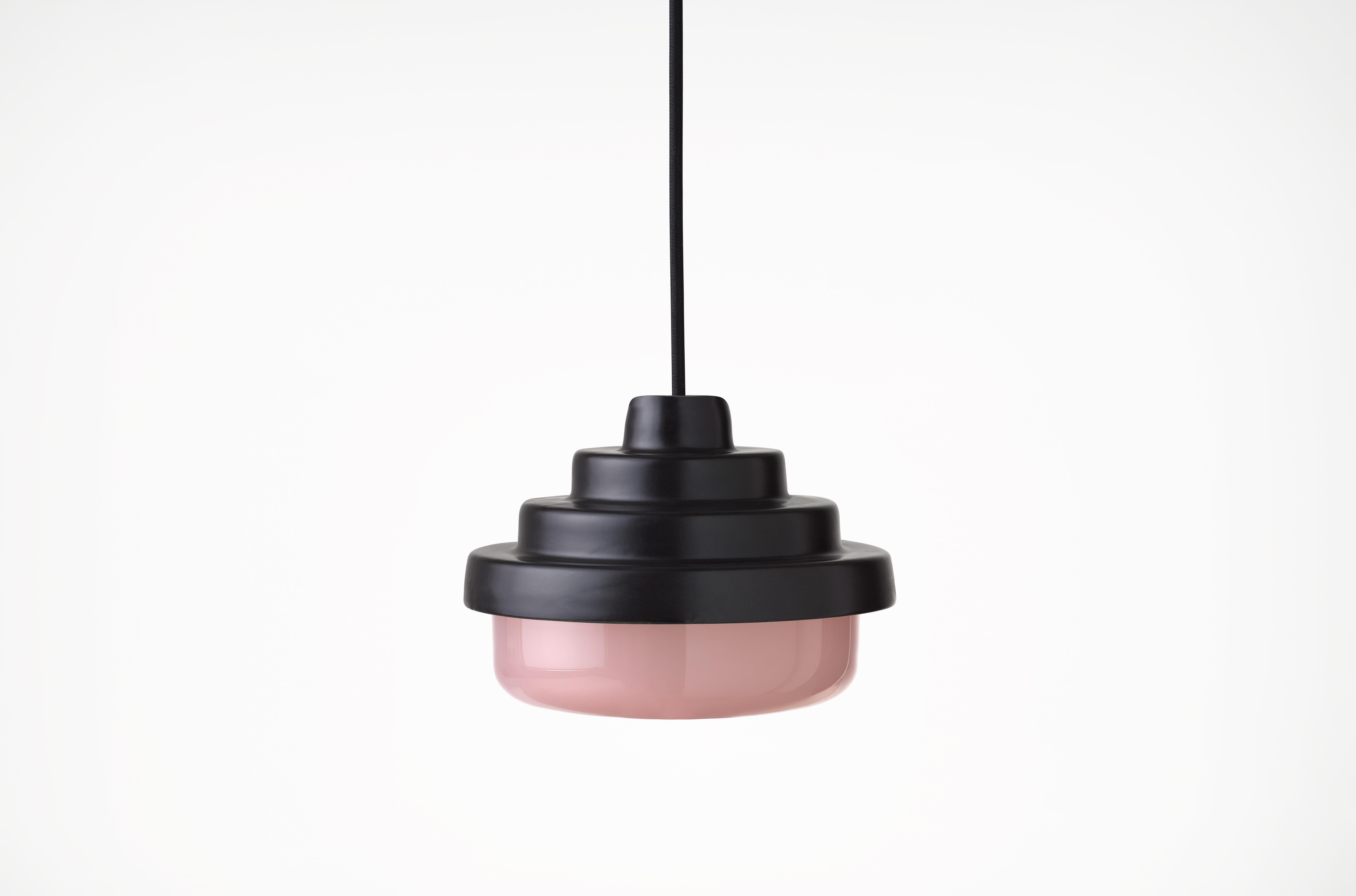 Black and Pink Honey Pendant Light by Coco Flip
Dimensions: D 18 x W 18 x H 13 cm
Materials: Slip cast ceramic stoneware with blown glass. 
Weight: Approx. 2kg
Glass finishes: Pink
Ceramic finishes: Black satin glaze. 

Standard fixtures included
1