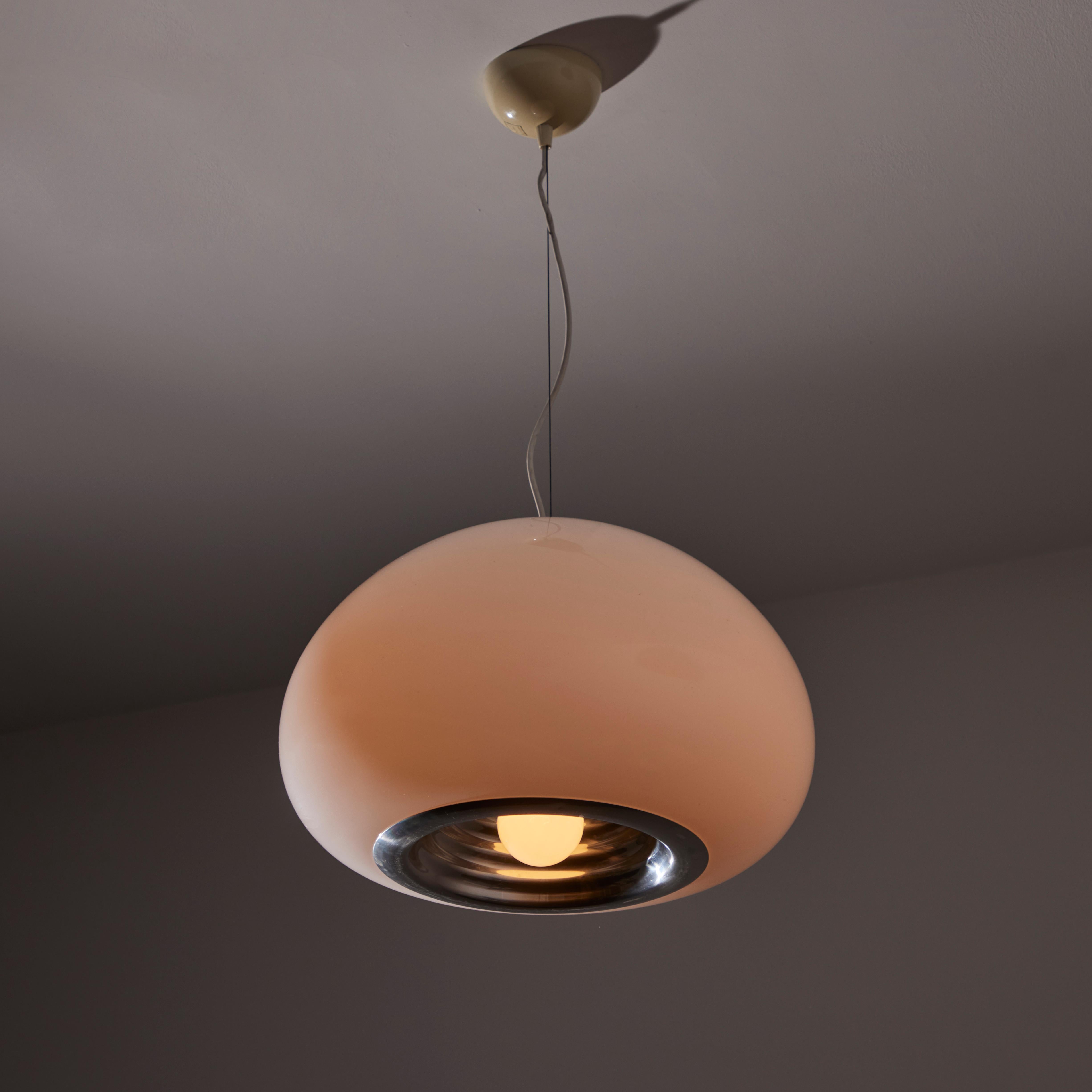'Black and White' Ceiling Light by Achille & Pier Giacomo Castiglioni for Flos. Designed and manufactured in Italy in 1965. And opaline outer glass Dome with an interior rippled aluminum reflector. This light holds a single e27 socket type, adapted