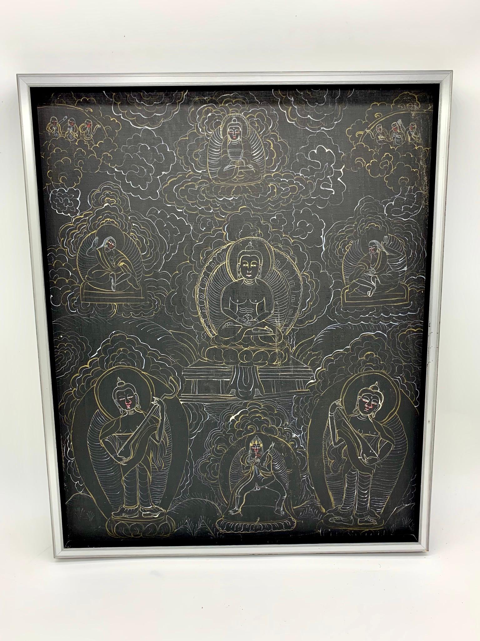 Black and white Chinese mandala with scenes of Buddha,
circa 20th century or earlier.
Framed in silver frame.