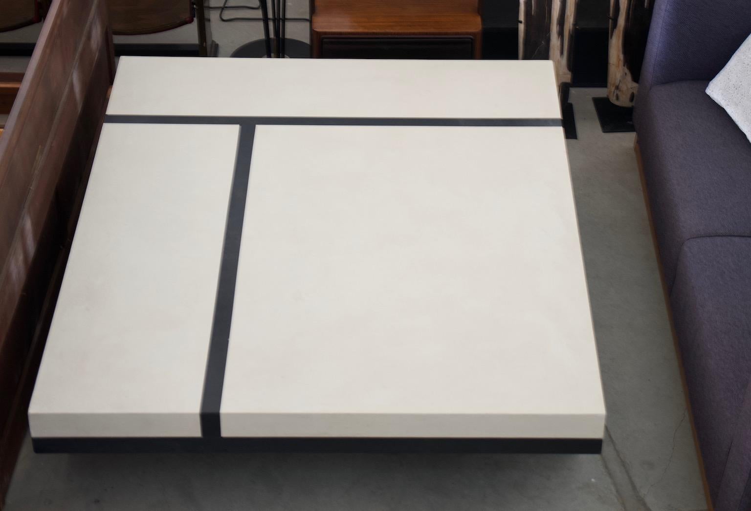 Coffee table by the Pierre Bonnefille workshops, rectangular top wrapped with tulle and painted over. Black lines crossing on a white background. Black feet.
Please note that the table is very heavy.

About the designer: Pierre Bonnefille is a