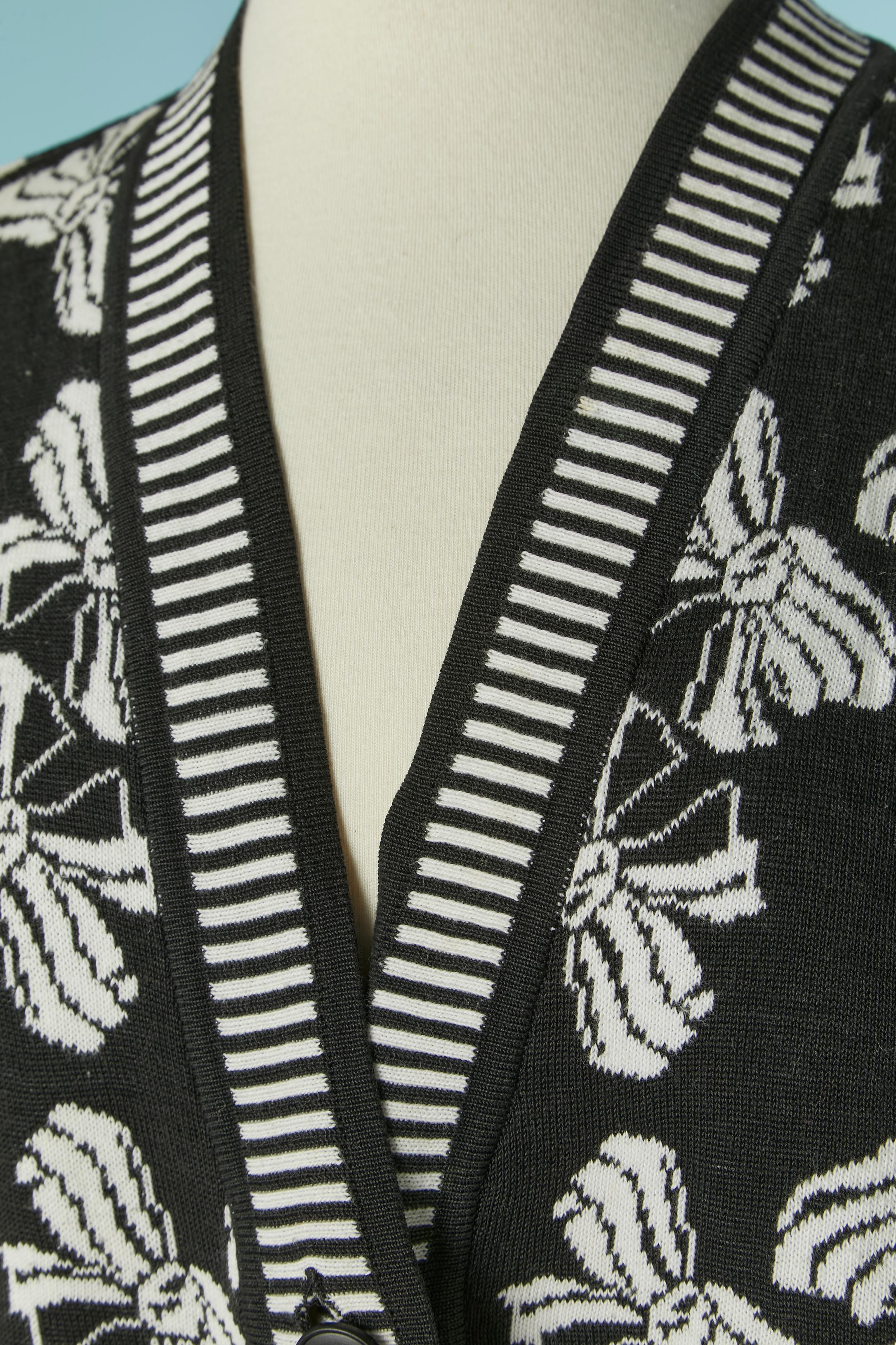 Cardigan en coton noir et blanc avec motif de nœud et manche 