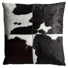 Coussin en peau de vache noir et blanc