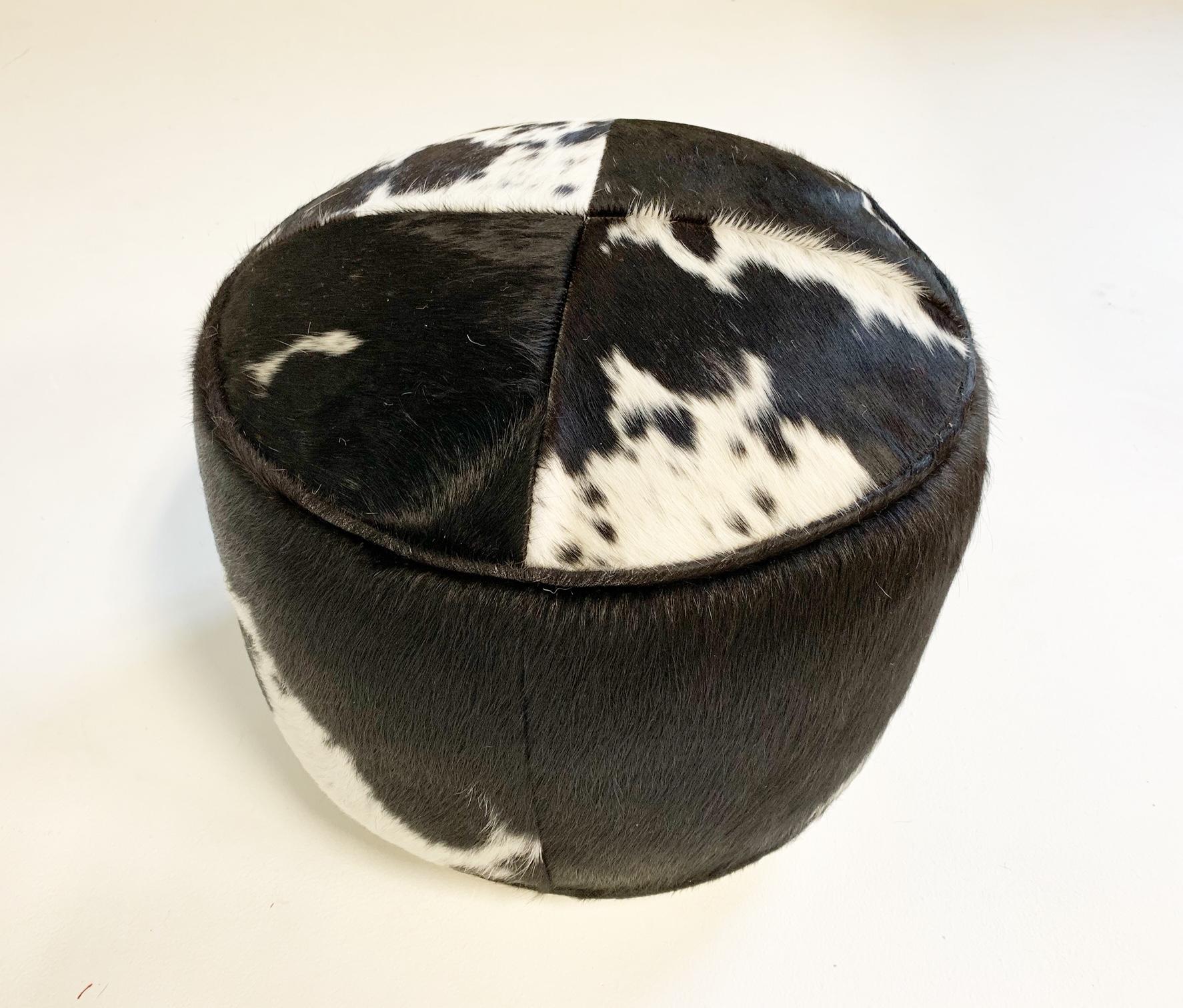 black and white cowhide ottoman