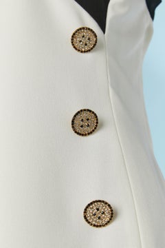 Black and white crepe cocktail dress with rhinestone button