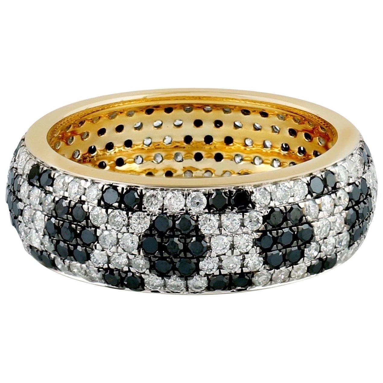 For Sale:  Black and White Diamond 14 Karat Gold Eternity Ring