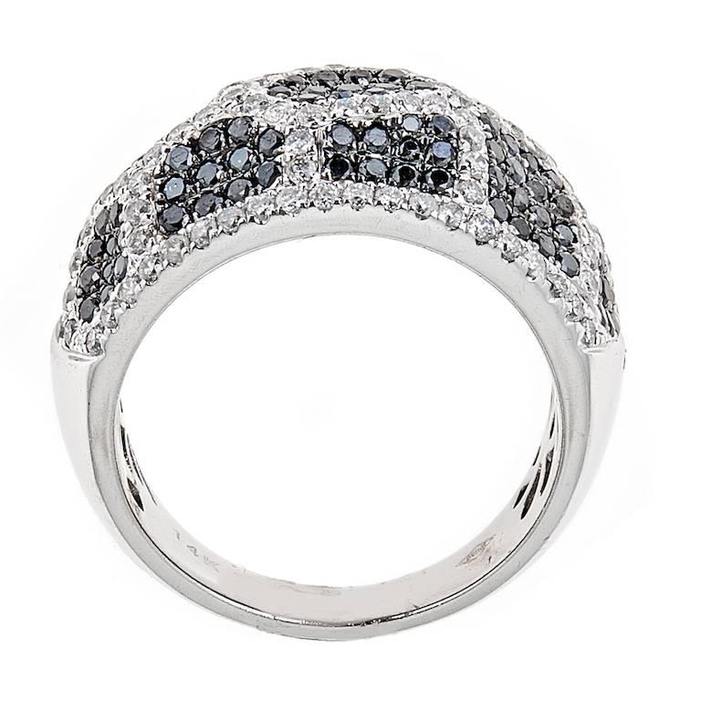Gorgeous design b the know designer Natalie K.  This beauty has approximately 1.83 CT in black and white diamonds.