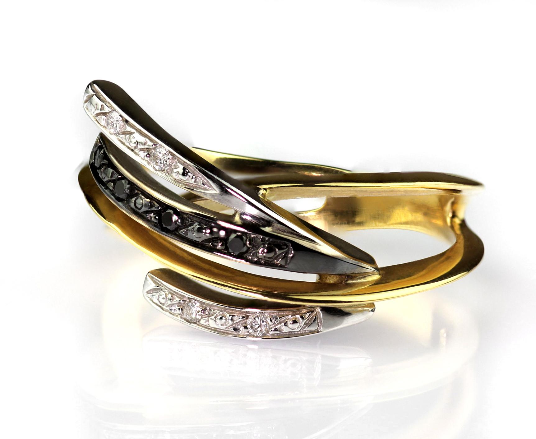 Modern Black and White Diamond Knife Edge Twist Ring in 18K White and Yellow Gold For Sale