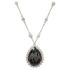 Collier pendentif en or blanc 14 carats avec diamants noirs et blancs