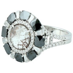 Ring mit weißen und weißen Diamanten in 18 Karat Gold gefasst 