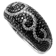 Black and White Diamond Swirl Ring in White Gold