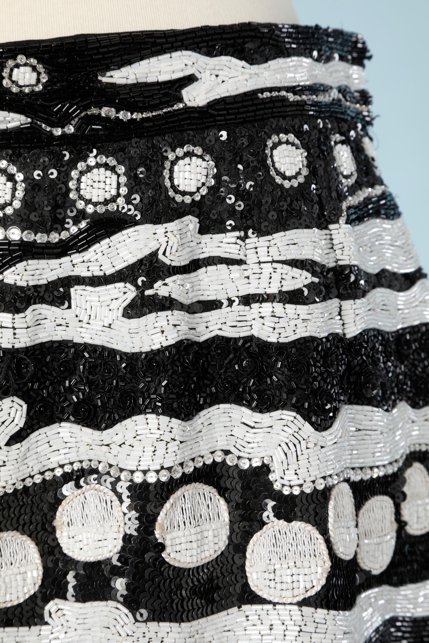 Black and white fully beaded evening skirt.
SIZE 12