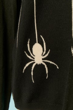 Jersey, bufanda y gorro de punto jacquard en blanco y negro JC/DC Jc de Castelbajac