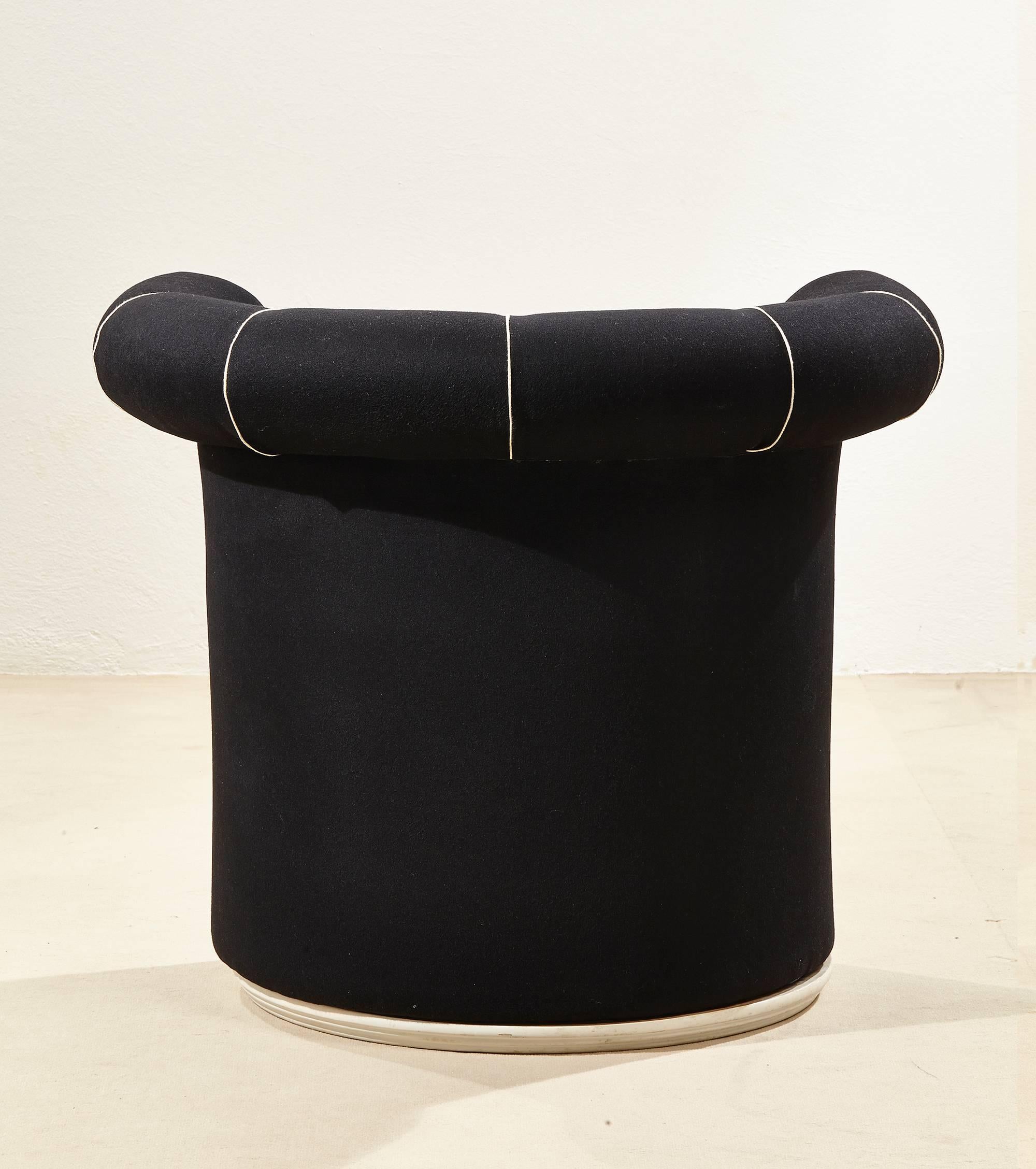 A rare early version of the famous Liuto armchair designed by Paolo Portoghesi for Poltronova. The piece dates from circa 1970 and is upholstered in black fabric instead of the more commonly seen leather.