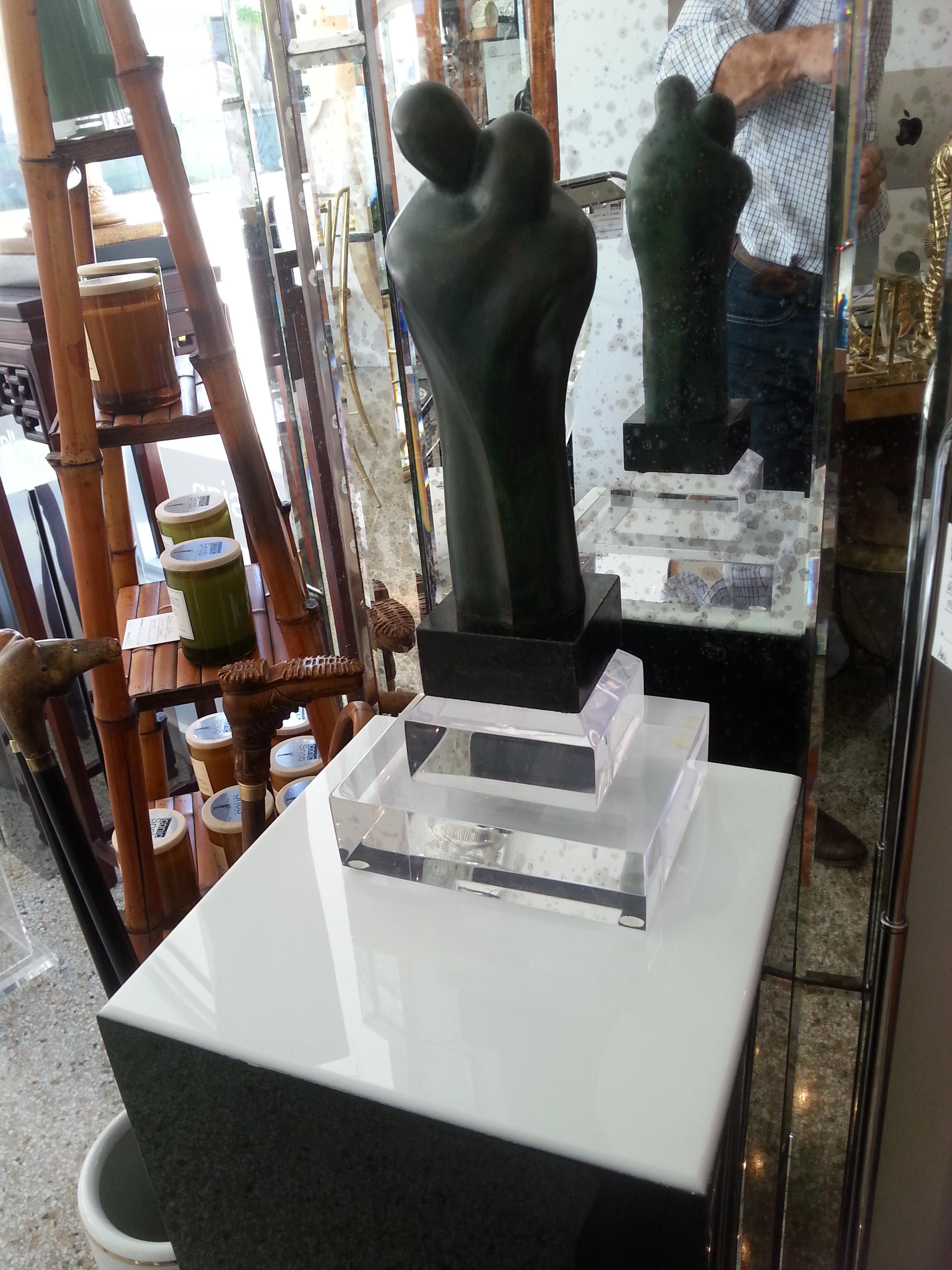 This black and white illuminated Lucite pedestal was a custom made piece in the 1990s.

Note: Requires on Edison based light bulb.

Note: There are two holes on the backside for heat ventilation.

Note: On and off switch in located on the