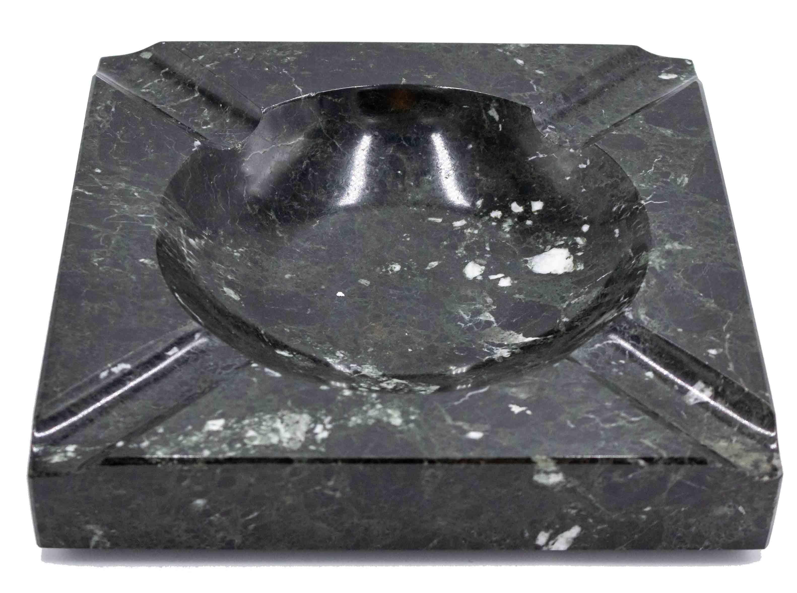 Oversized rectangular black and white marble ashtray with four recesses.
 
