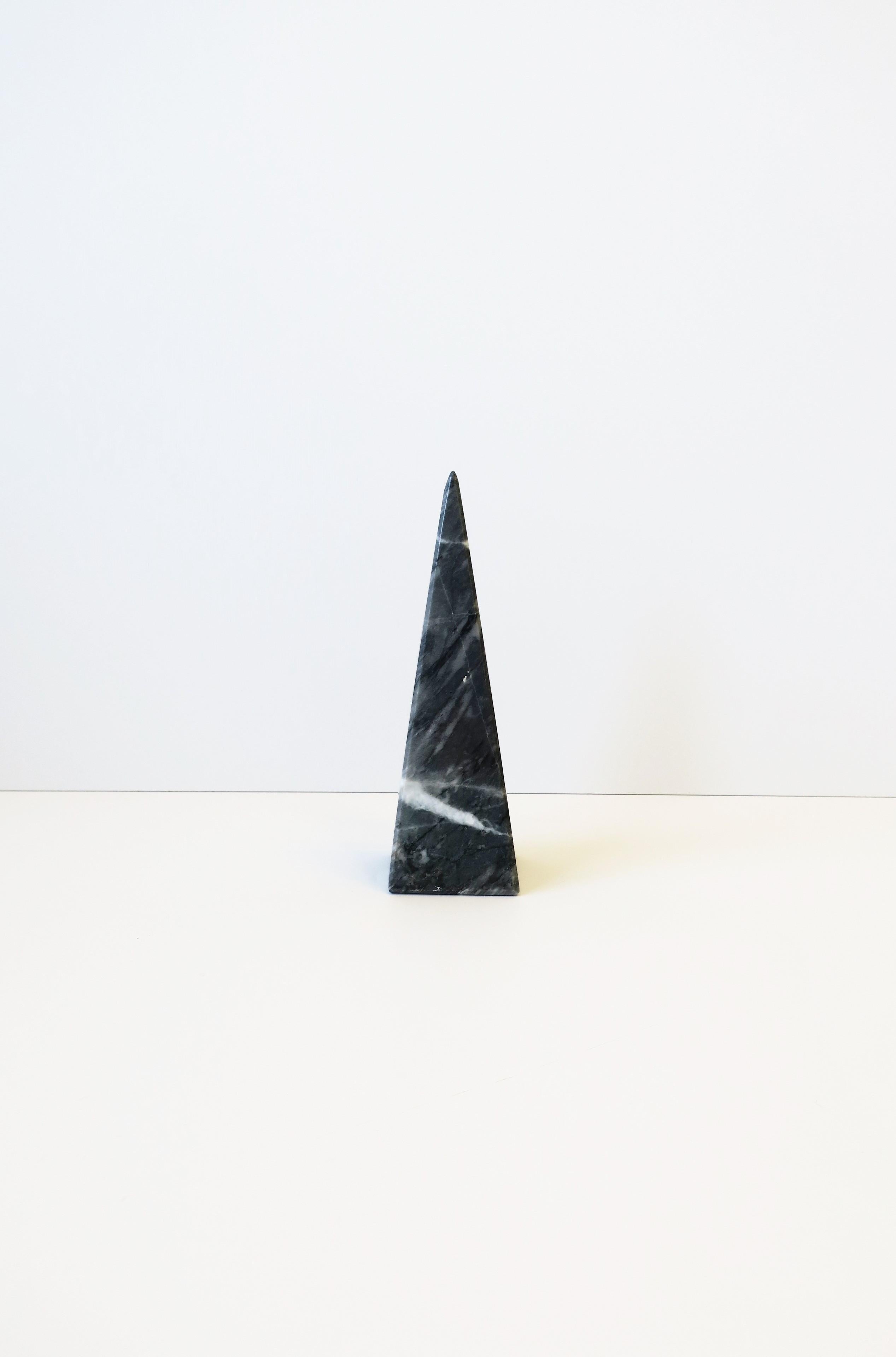 A black, charcoal and white marble pyramid 'Obelisk style', circa 1970s, 20th century. Dimensions: 2.63