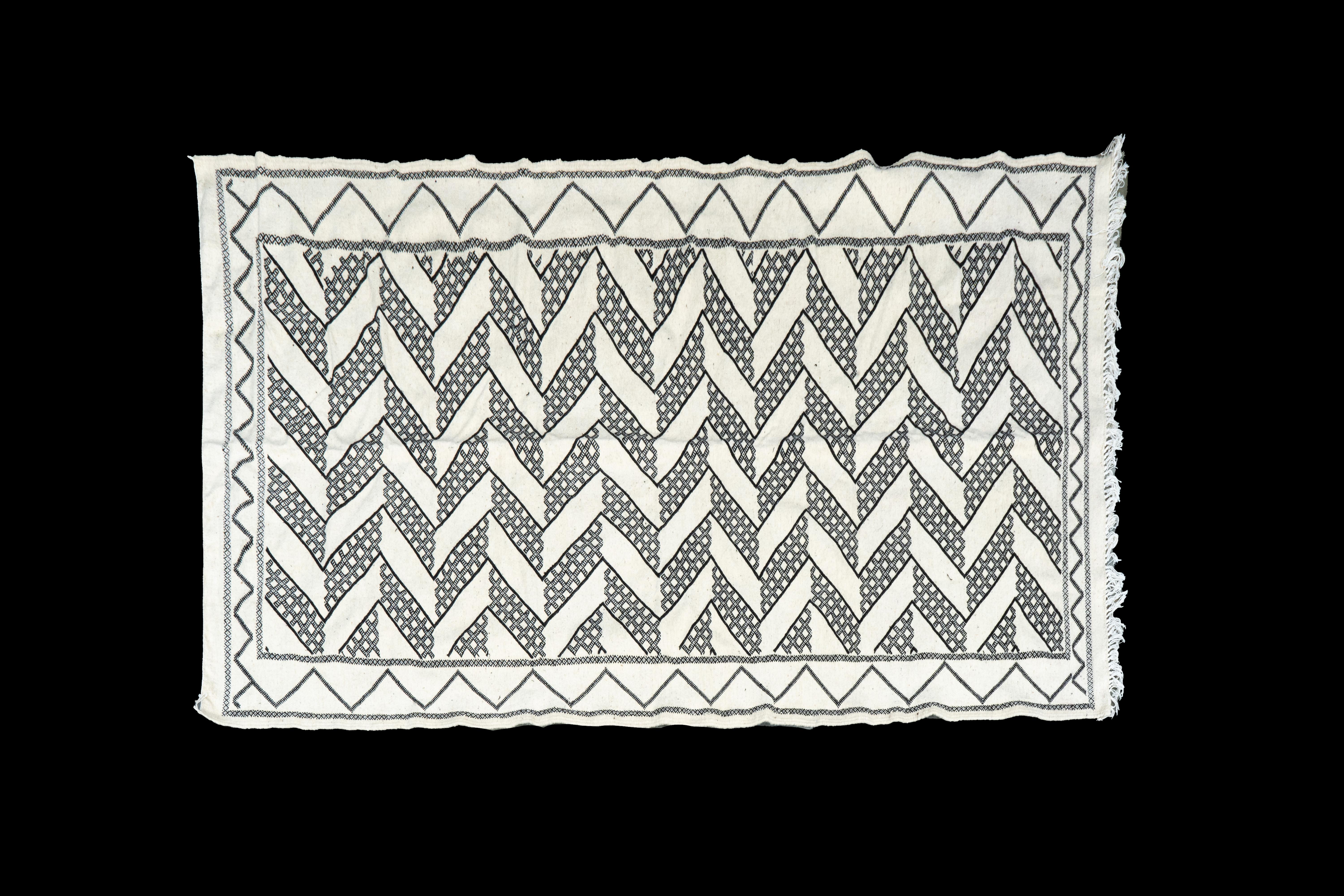 Black and White Moroccan Rug:

Measures: 9' 2