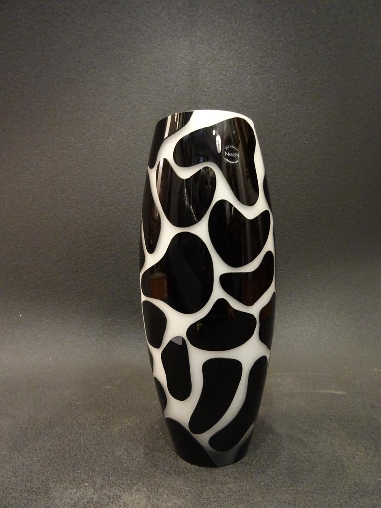 A stunning Murano glass vase with a striking design, ‘COW’ model. A large vase made by Murano Vetreria. Black and white colour, made with a first lattimo glass layer, ‘incamiciato’ with satin glass and covered with a black opal glass mosaic. 