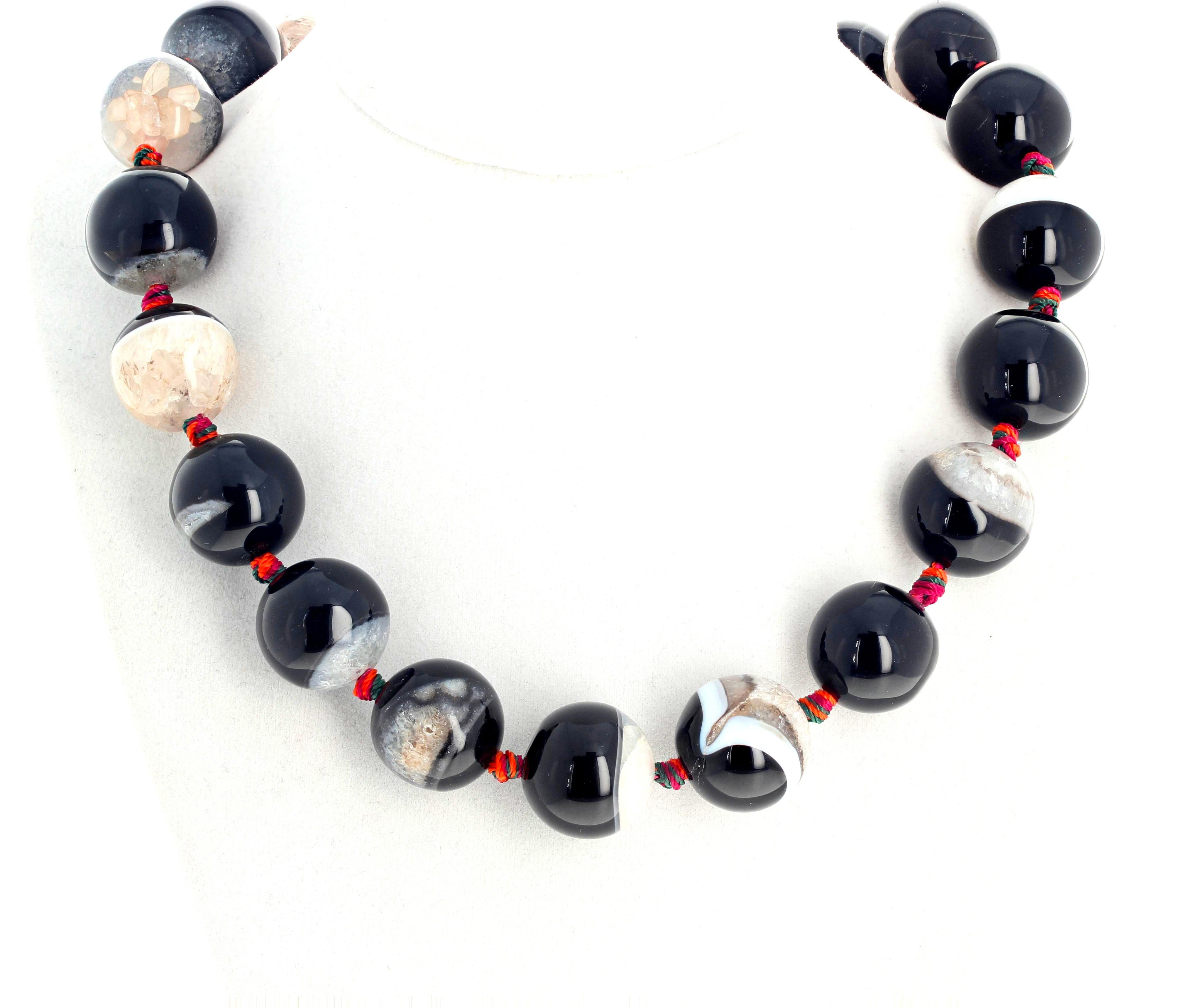 Beautiful natural black and white highly polished Onyx (20 mm) are knotted  to show them off well and have an easy to use silver plated hook clasp.  This Onyx necklace is 19 inches long.  More from this jeweler by putting Gemjunky into your 1stdibs
