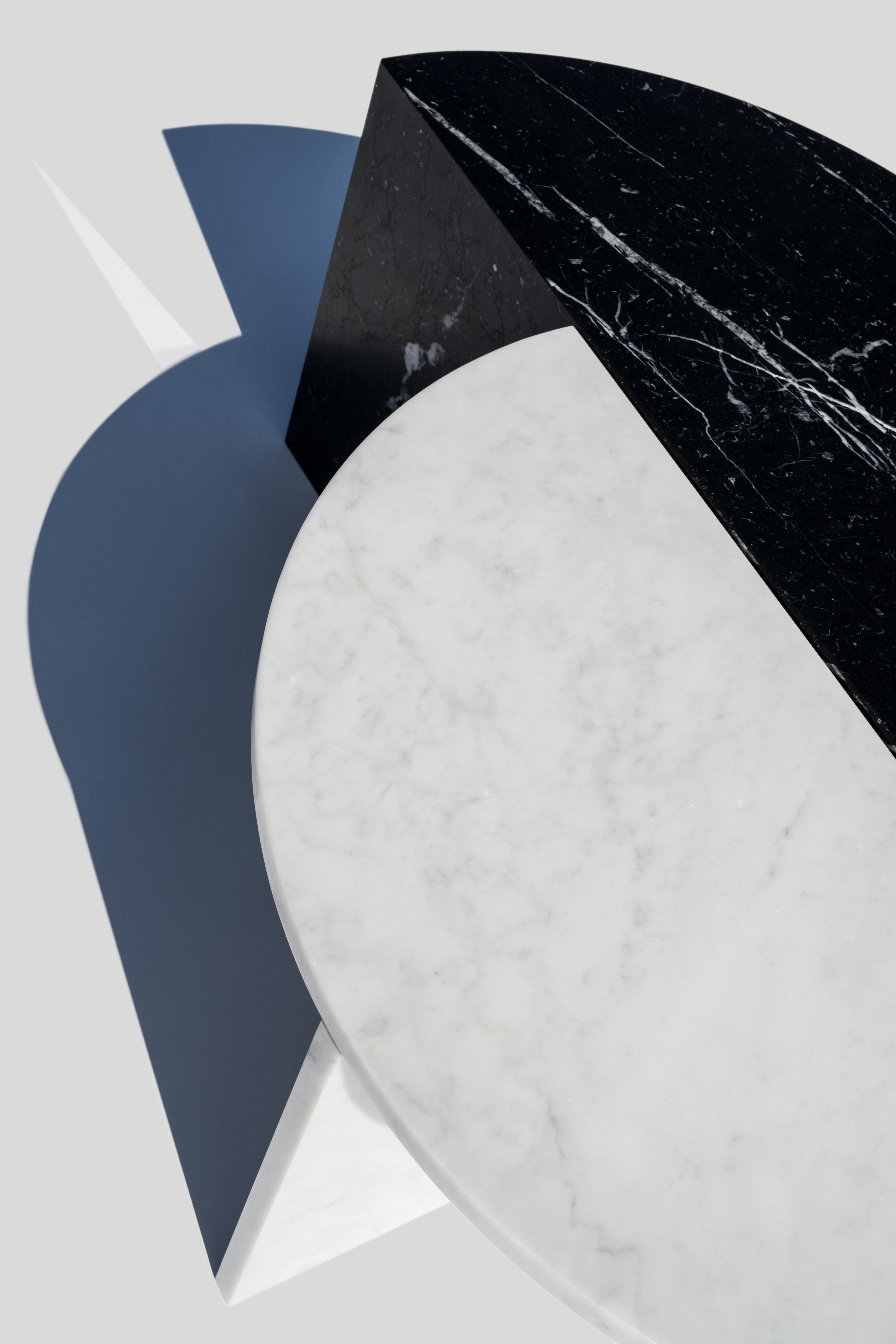 Materials: Marble;
Marble: Nero Marquina (black); Carrara (white)
Dimensions: 70 x 35 x 35
Designer: Sebastian Scherer

These coffee tables can be combined in a variety of ways creating an interesting mix of form and material. The tables are