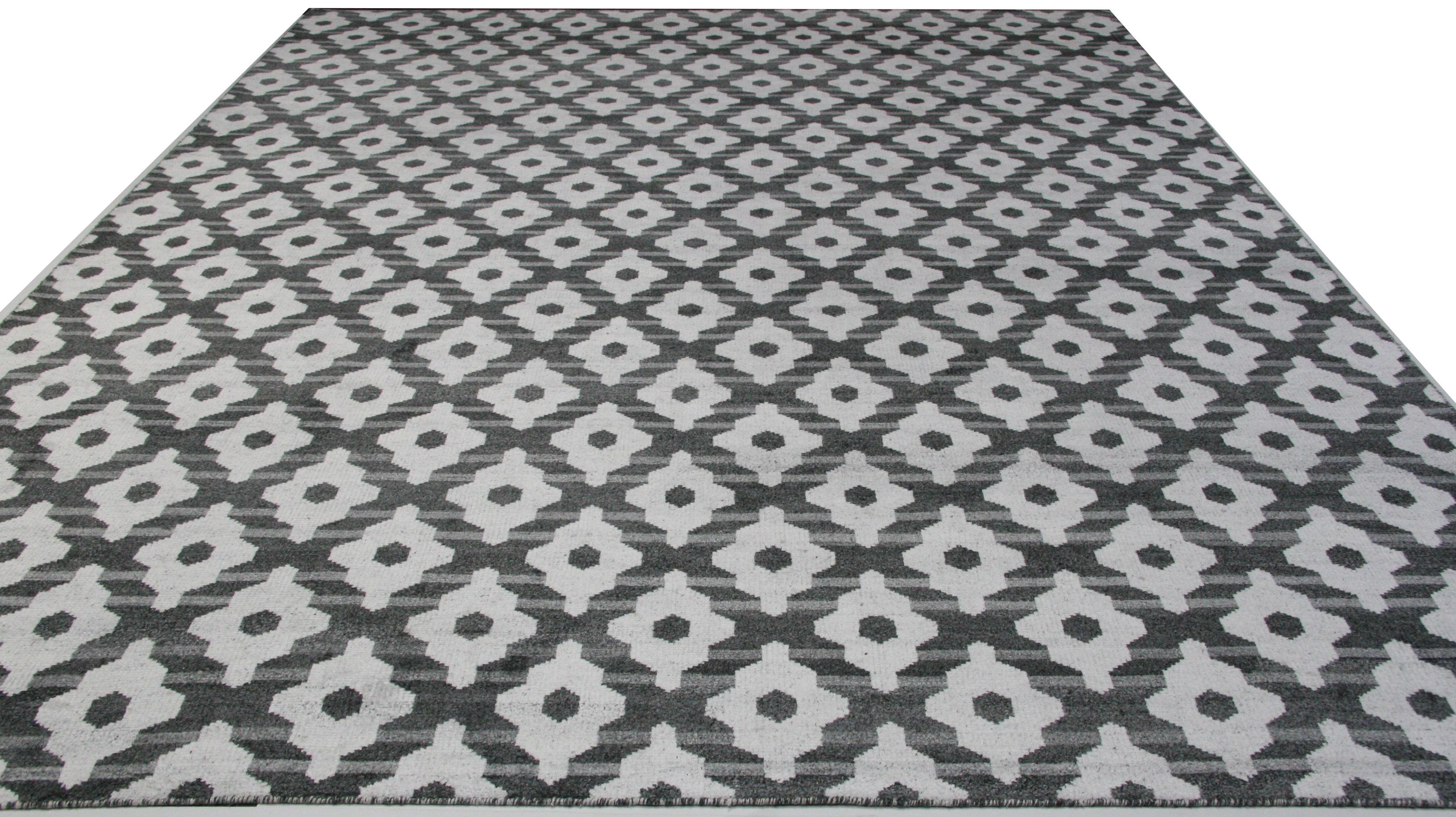 Make a strong statement in a large space with this finely balanced geometric pattern in black and white. Bold enough to perform on its own but would work equally well as a stage on which contemporary furniture can star. Handcrafted in India. Wool.