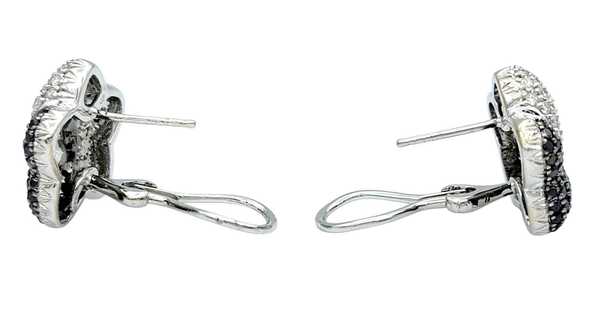 Contemporary Black and White Pavé Diamond Star Stud Omega Back Earrings 18 Karat White Gold For Sale