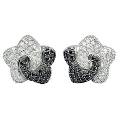 Black and White Pavé Diamond Star Stud Omega Back Earrings 18 Karat White Gold