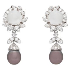 Boucles d'oreilles détachables en perles noires et blanches avec diamants